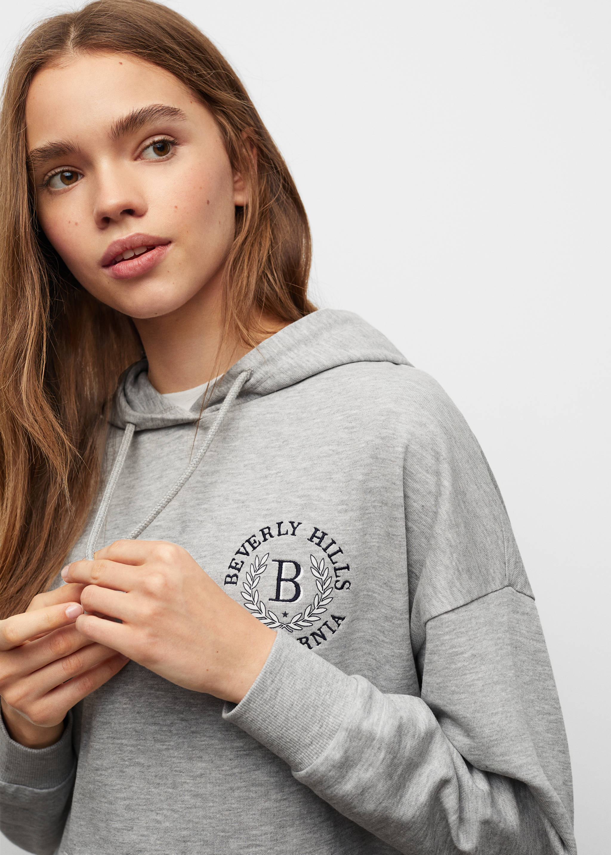 Dessuadora cotó caputxa - Detall de l'article 1