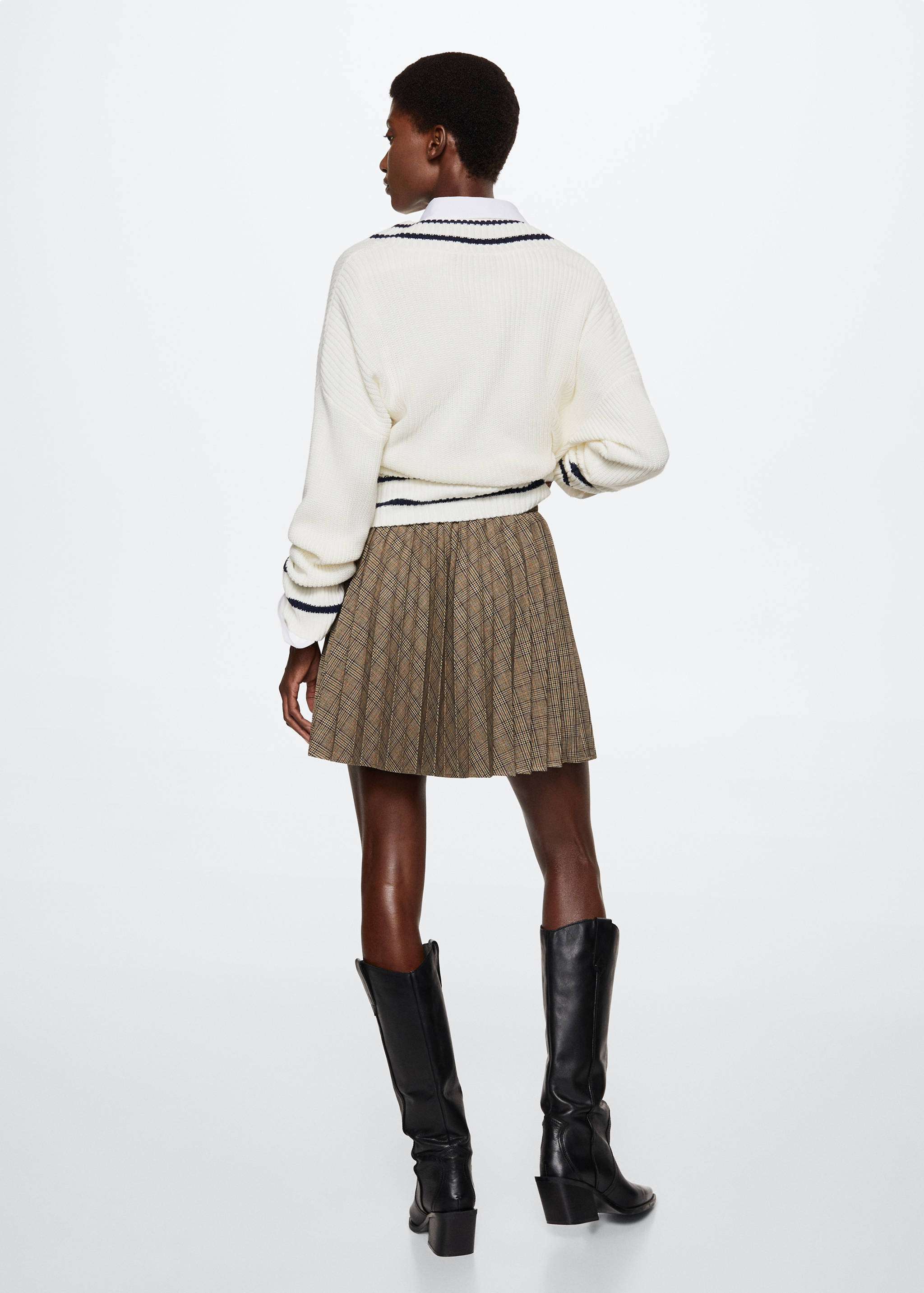 Rutig kjol med motveck - Artikelns baksida