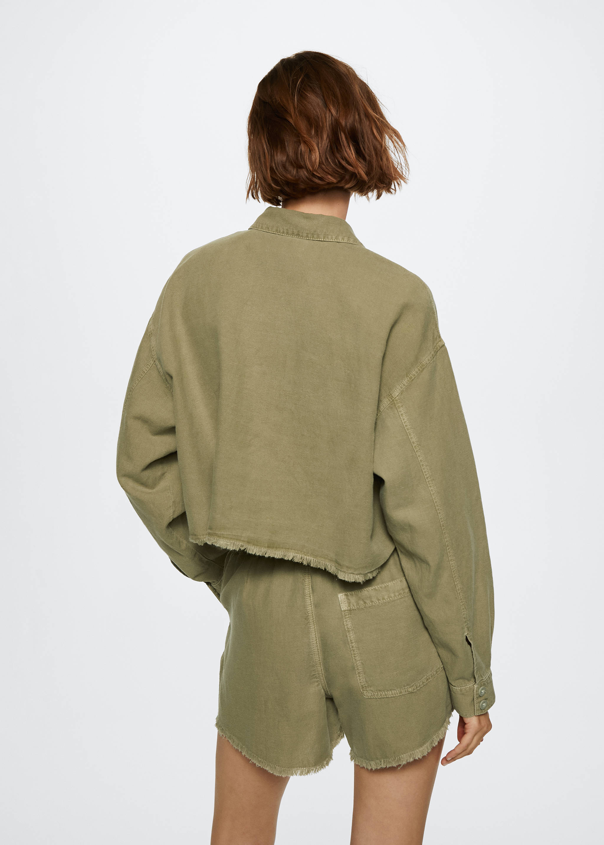 Chaqueta vaquera bolsillos  - Reverso del artículo