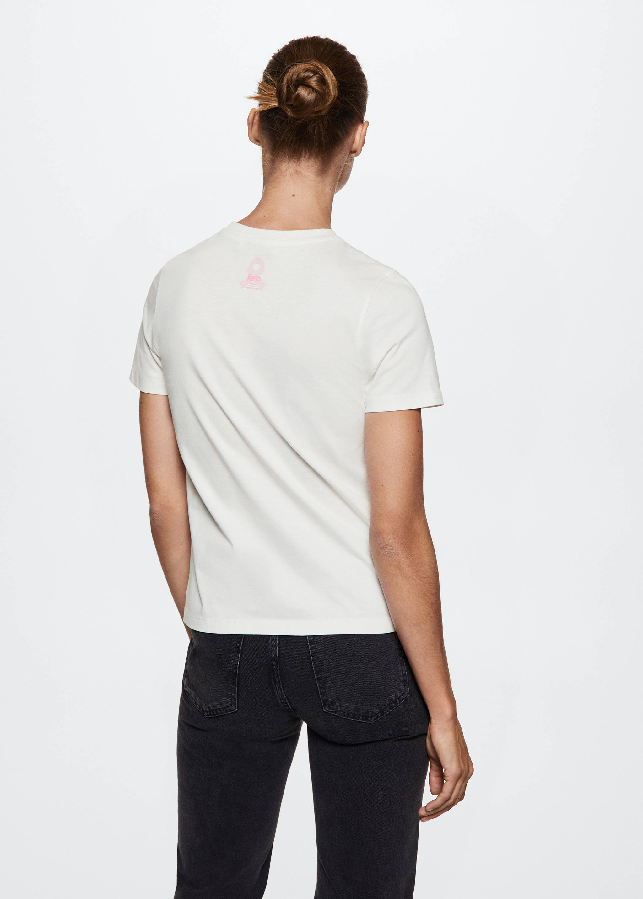 Camiseta solidaria bordado - Reverso del artículo