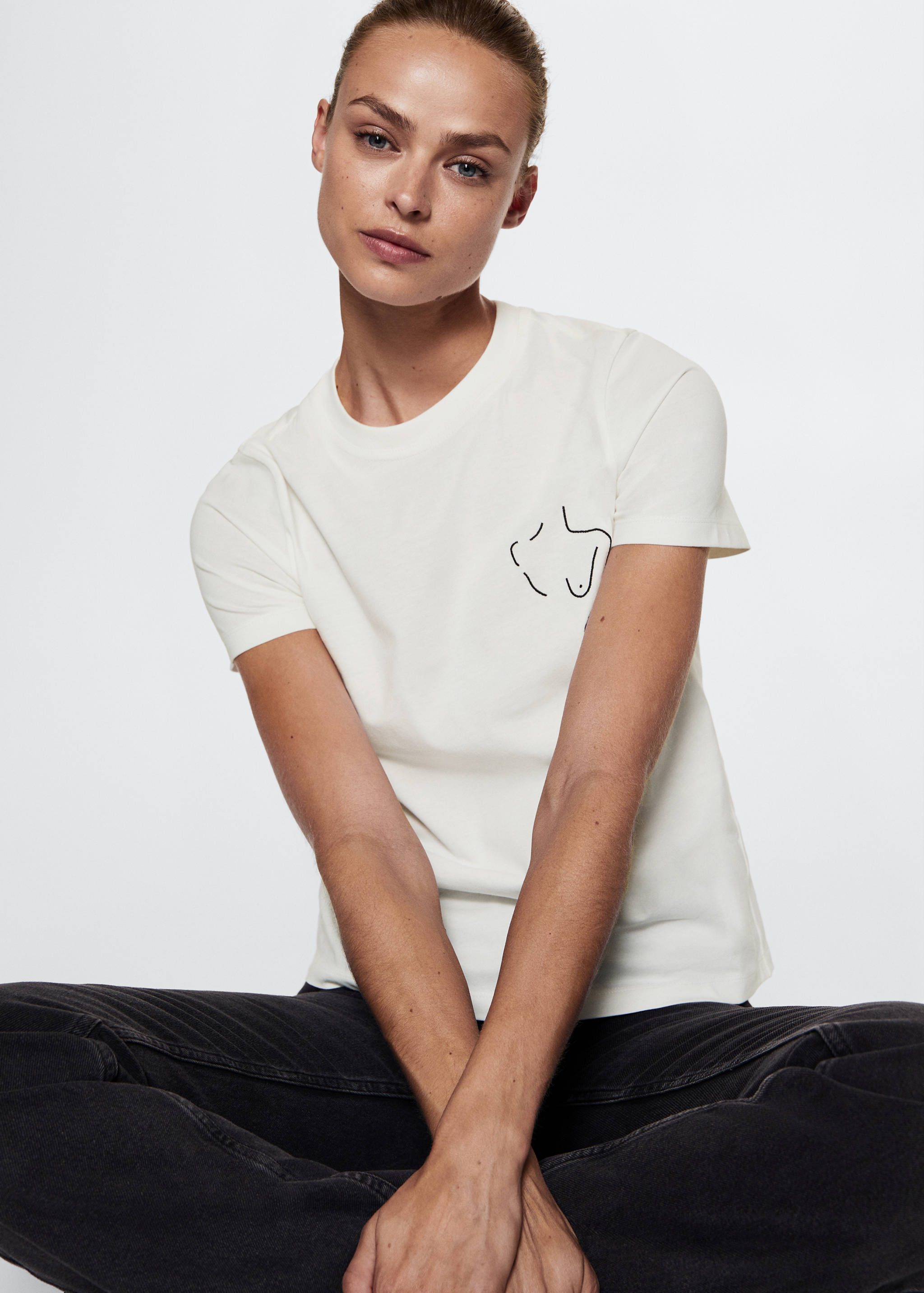 Camiseta solidaria bordado - Detalle del artículo 2