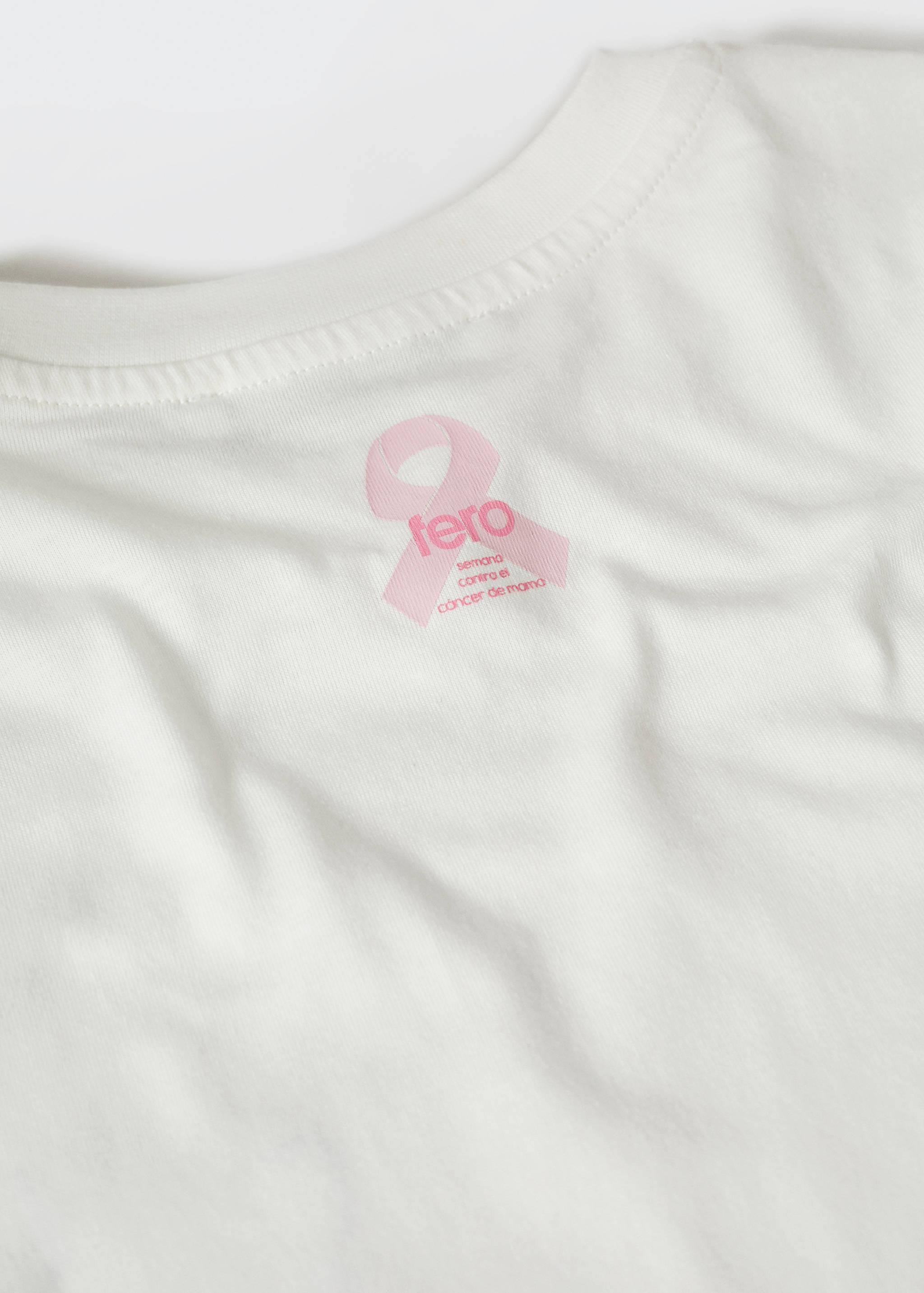 Camiseta solidaria bordado - Detalle del artículo 0