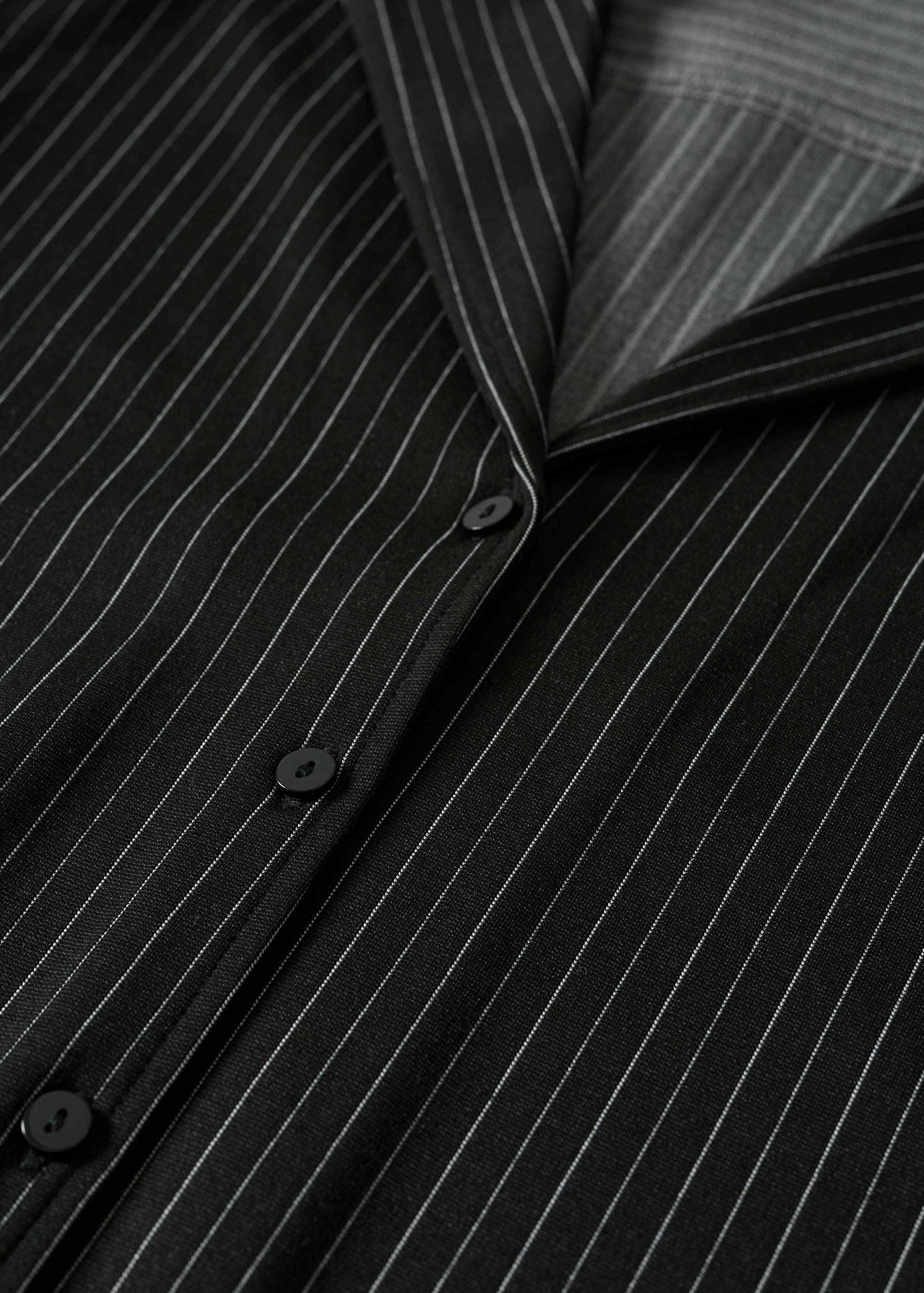 Camisa ratlla diplomàtica - Detall de l'article 8