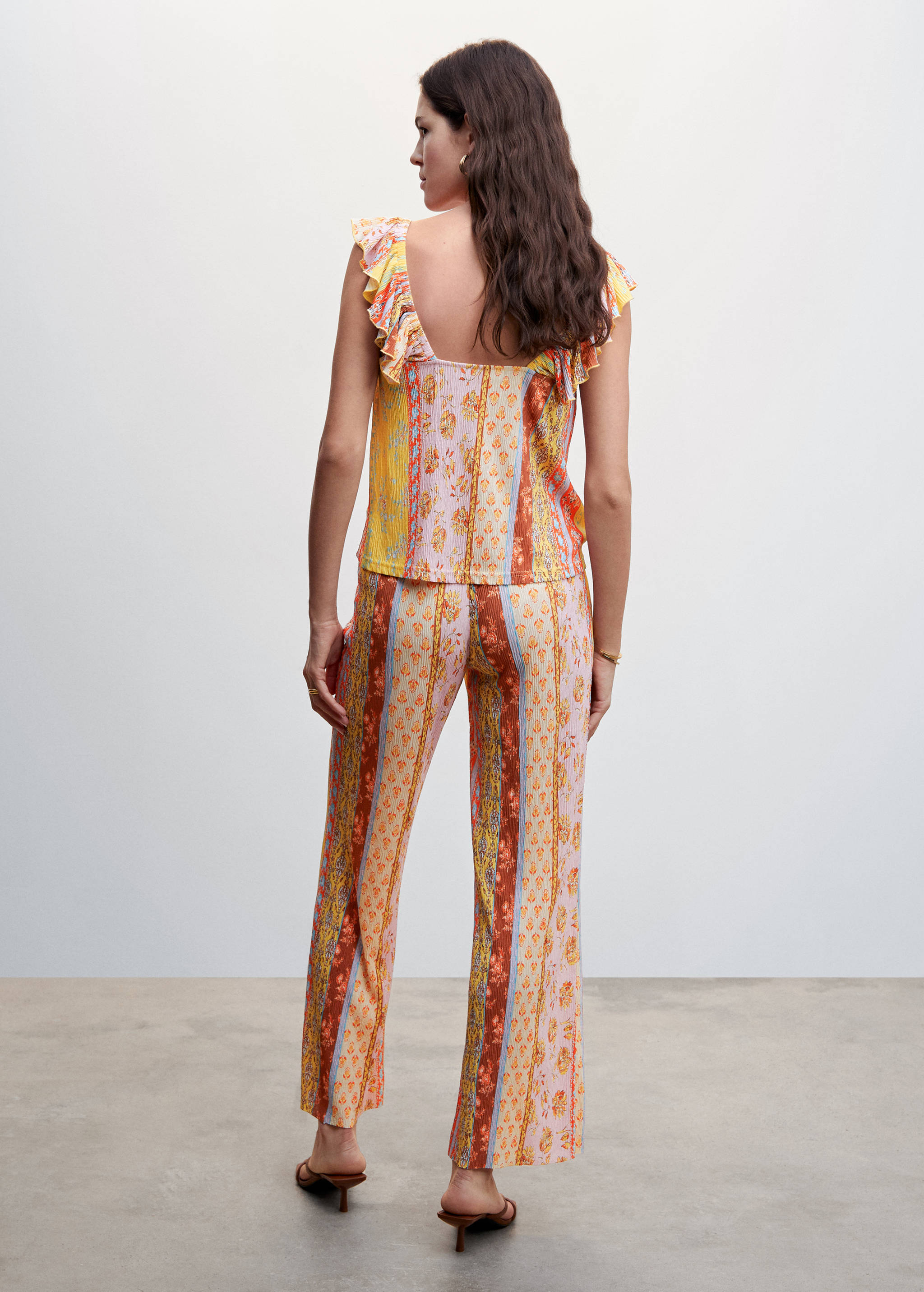 Pantalons textura estampat - Revers de l'article