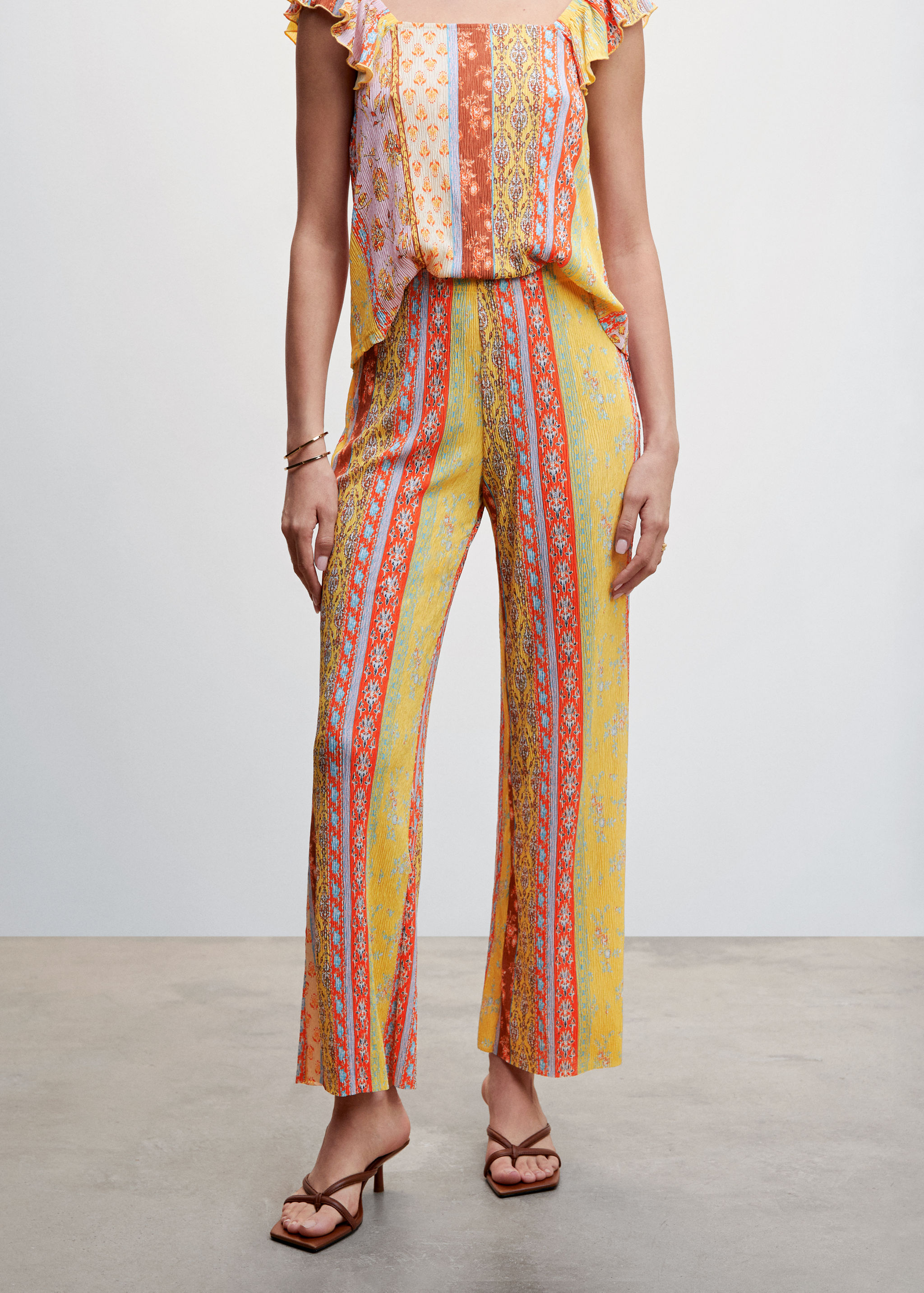 Pantalons textura estampat - Pla mig