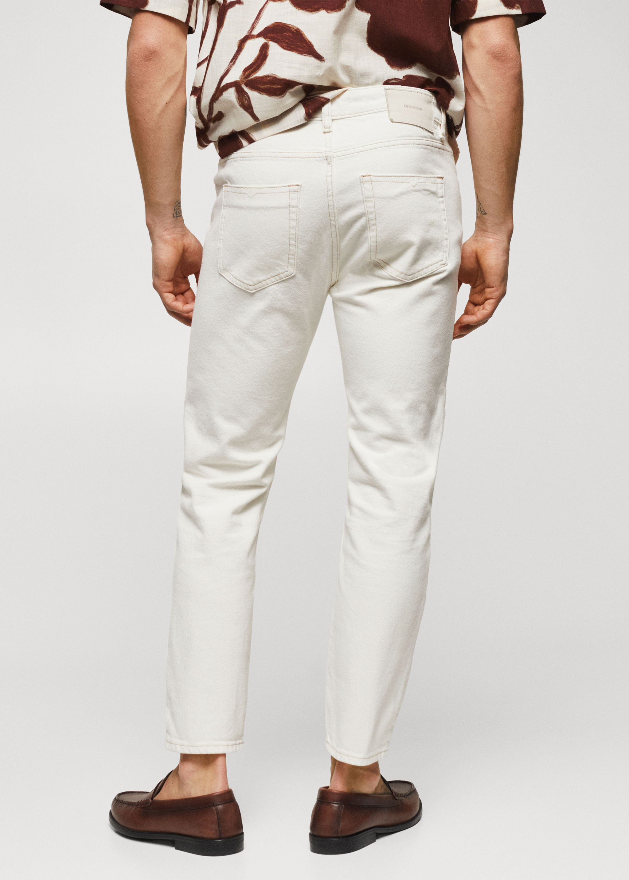 Jeans Ben tapered e cropped - Verso do artigo