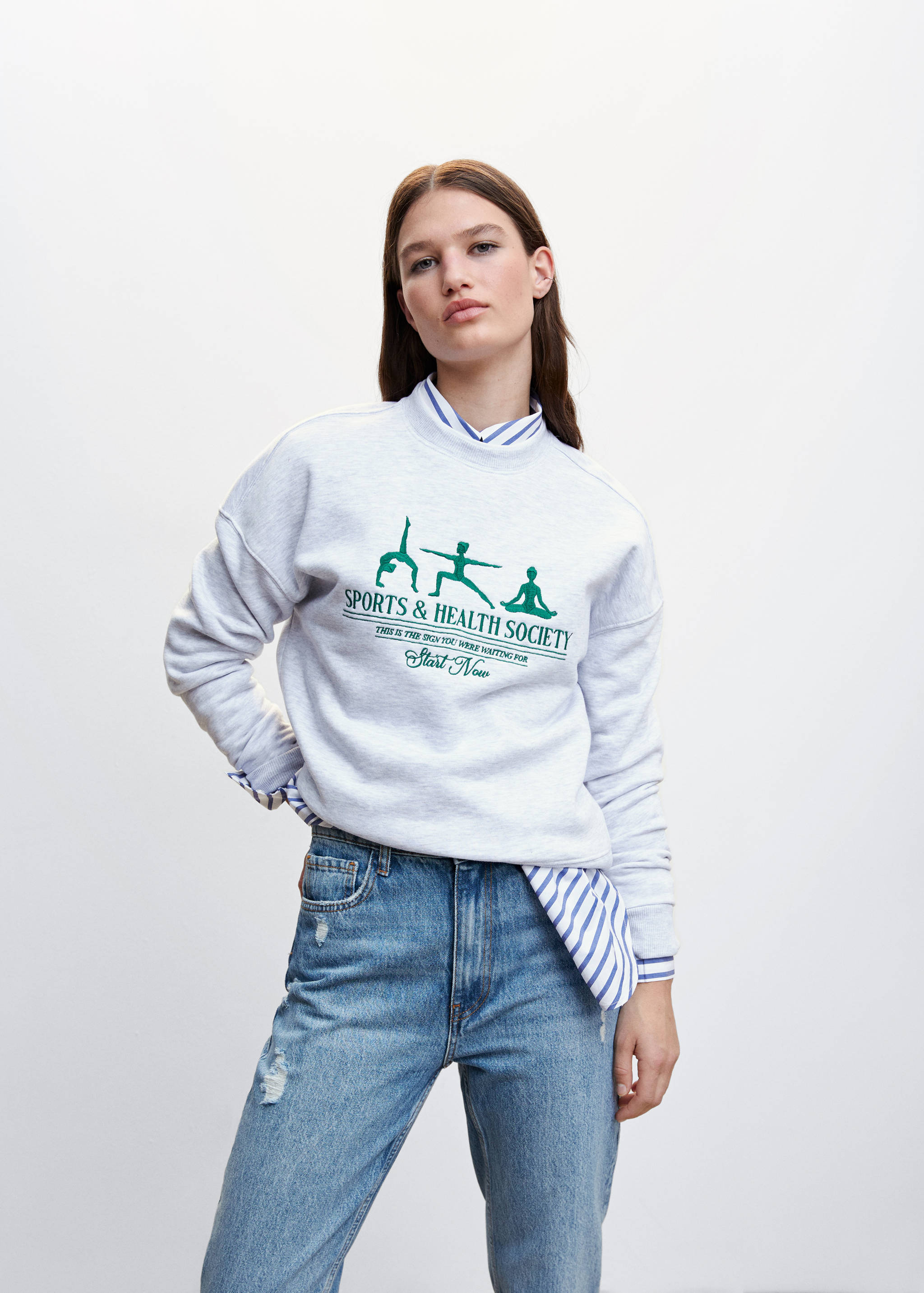 Ripped high-rise straight jeans - Details of the article 1