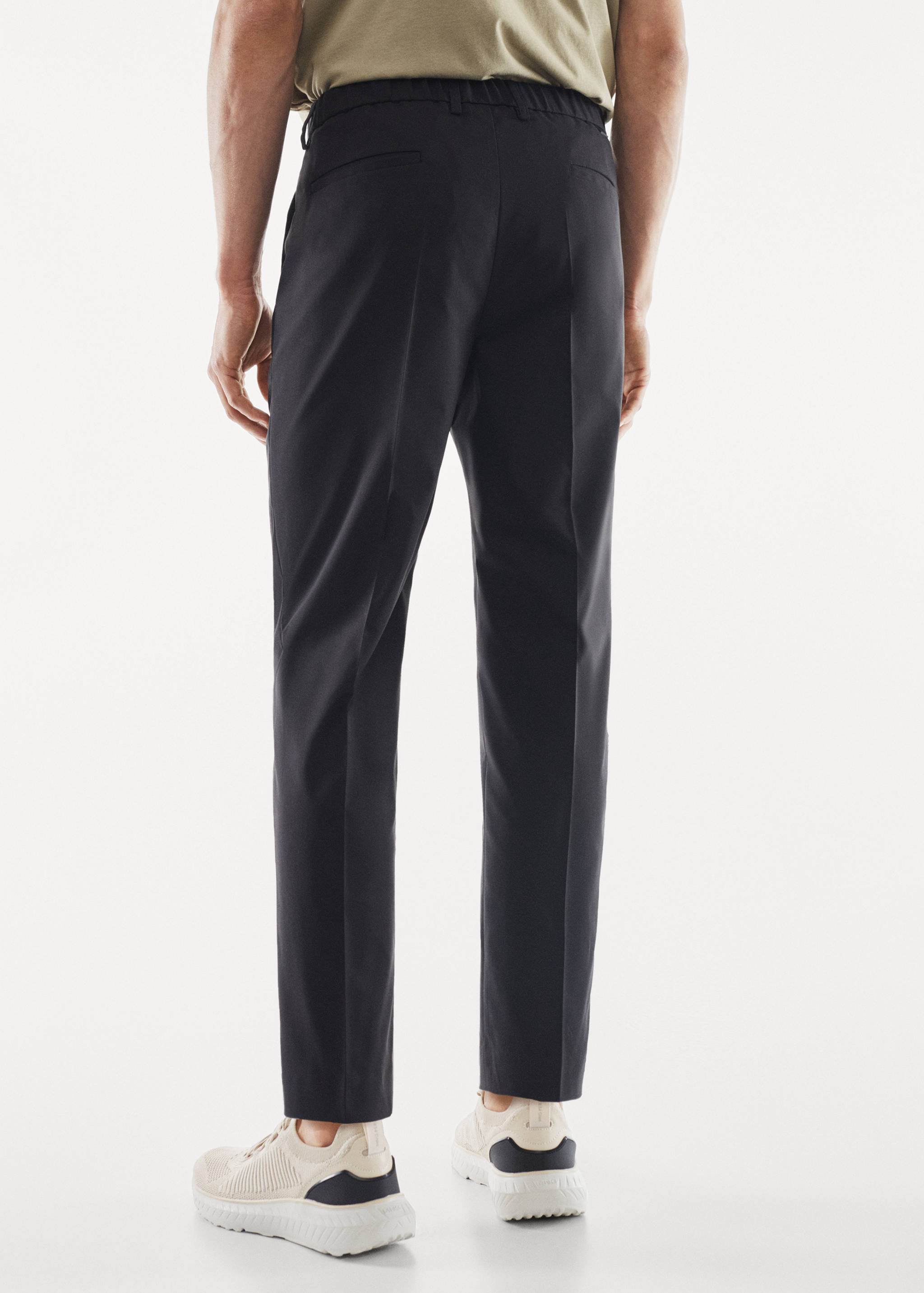 Pantalon costume slim fit tissu technique - Verso de l’article