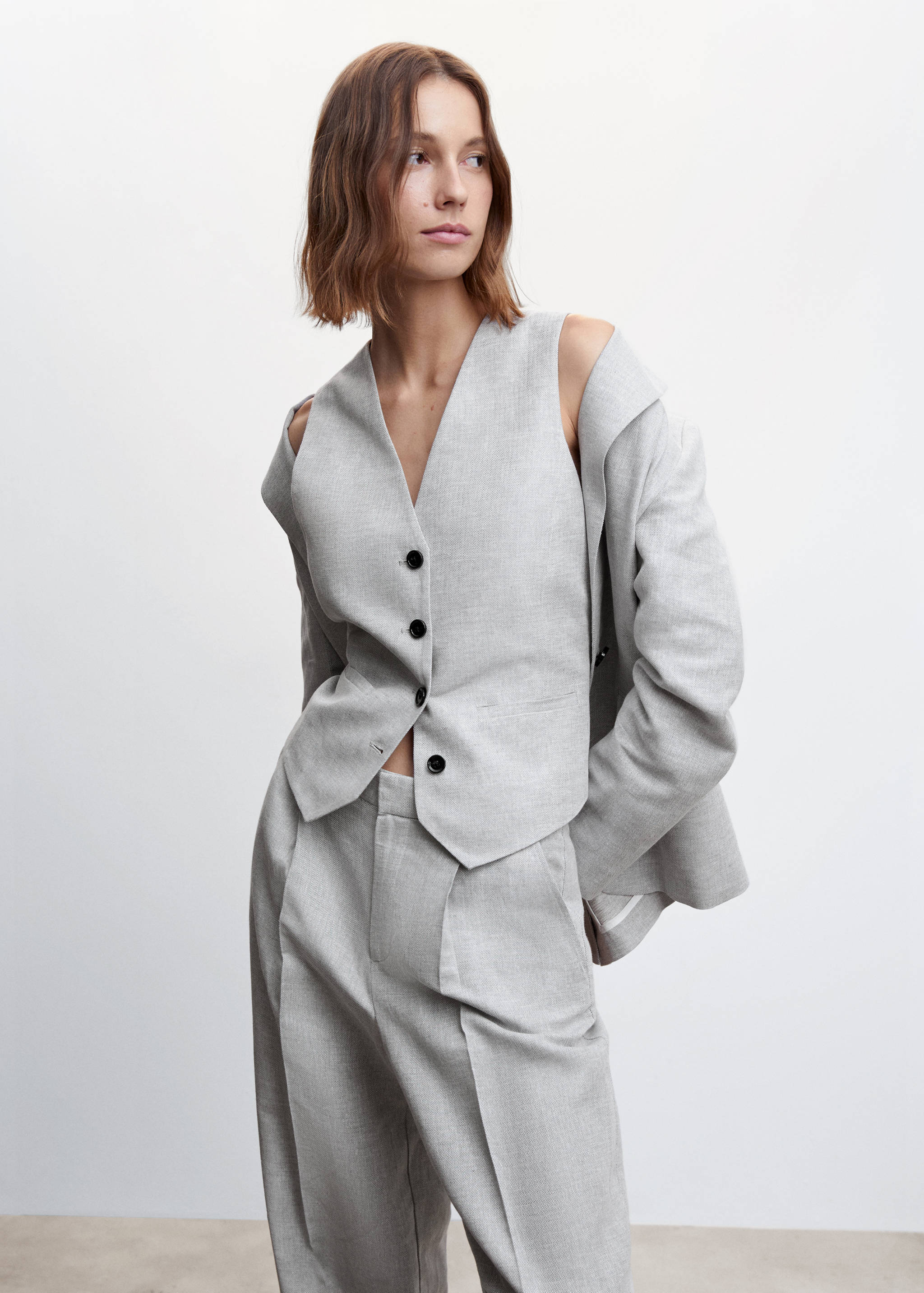 Herringbone linen suit trousers - Details of the article 1