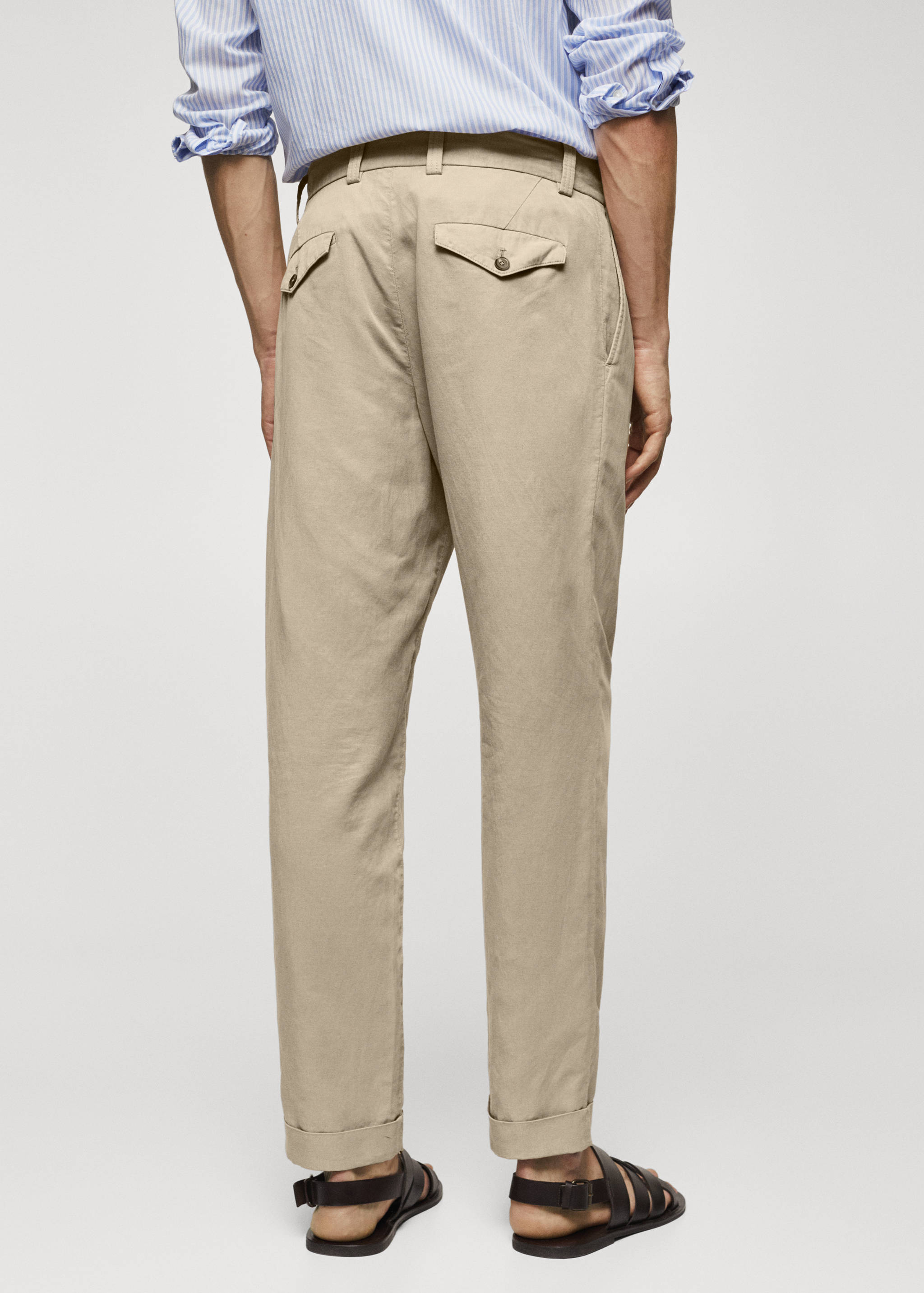 Pantalons tapered fit pinces - Revers de l'article