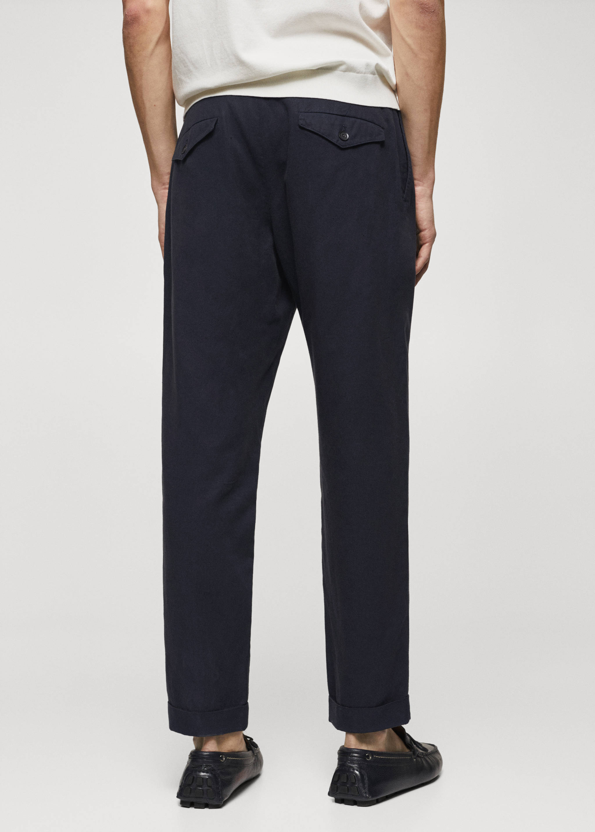 Pantalons tapered fit pinces - Revers de l'article