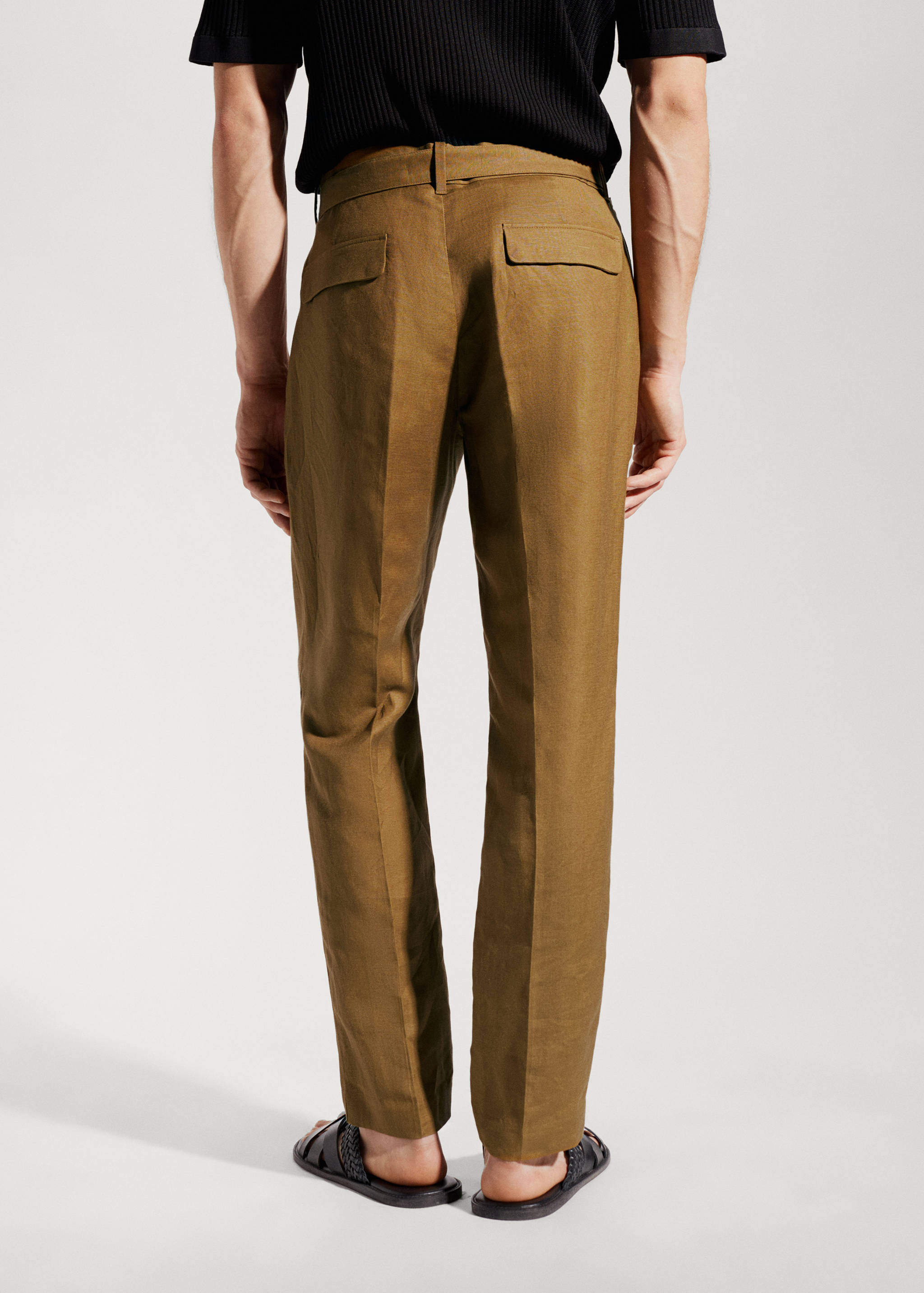 Belt line trousers - Reverse of the article