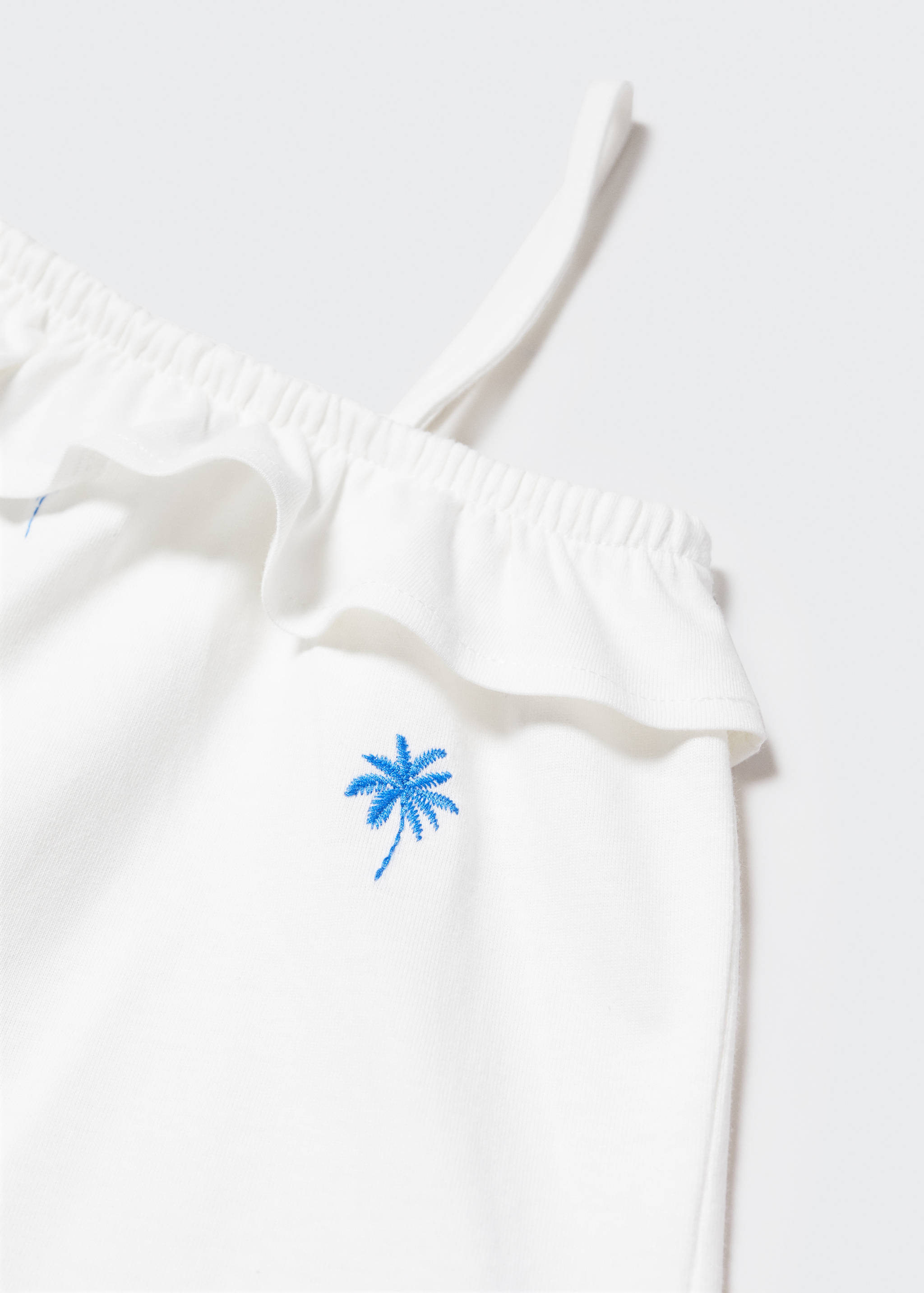 Asymmetrische Bluse mit Motiv - Detail des Artikels 8