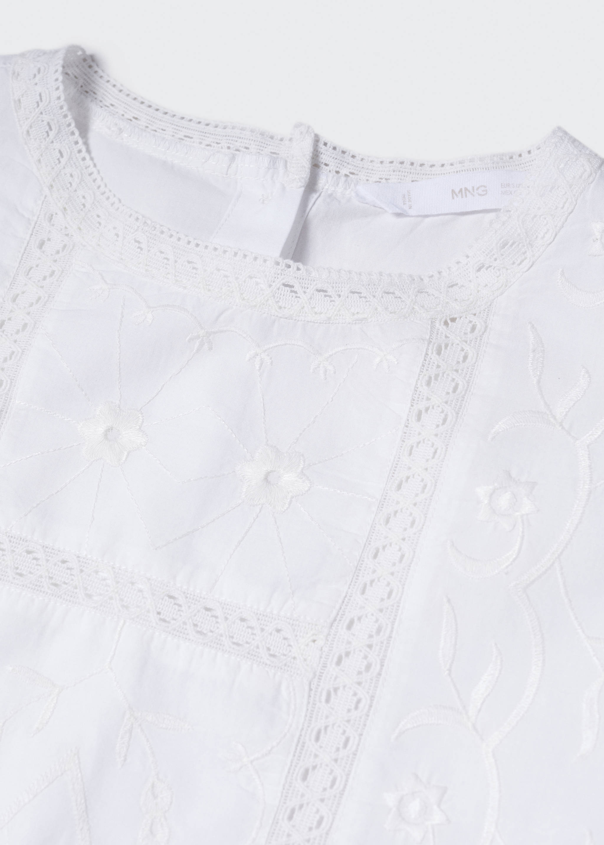 Geborduurde blouse met pofmouwen - Detail van het artikel 8