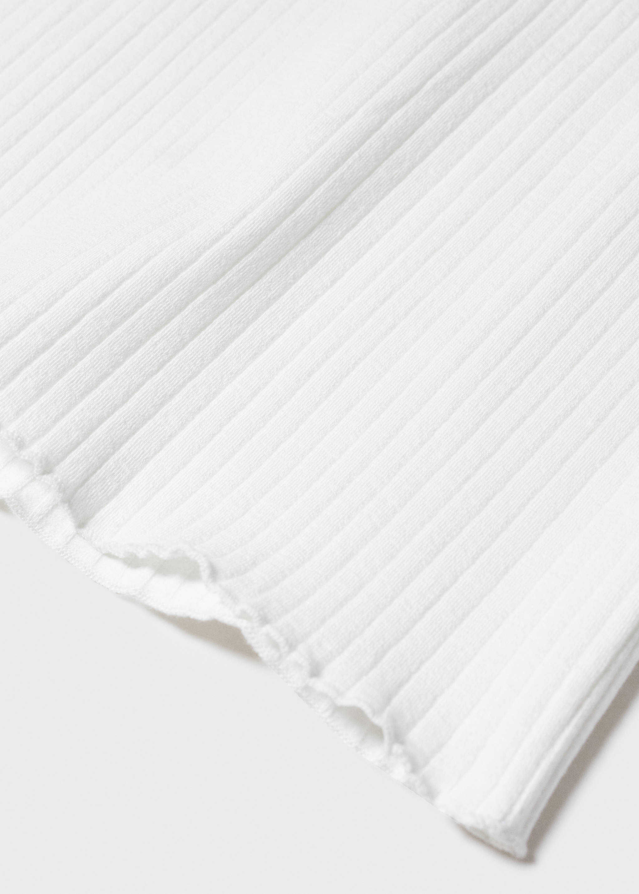 Top cotó - Detall de l'article 8