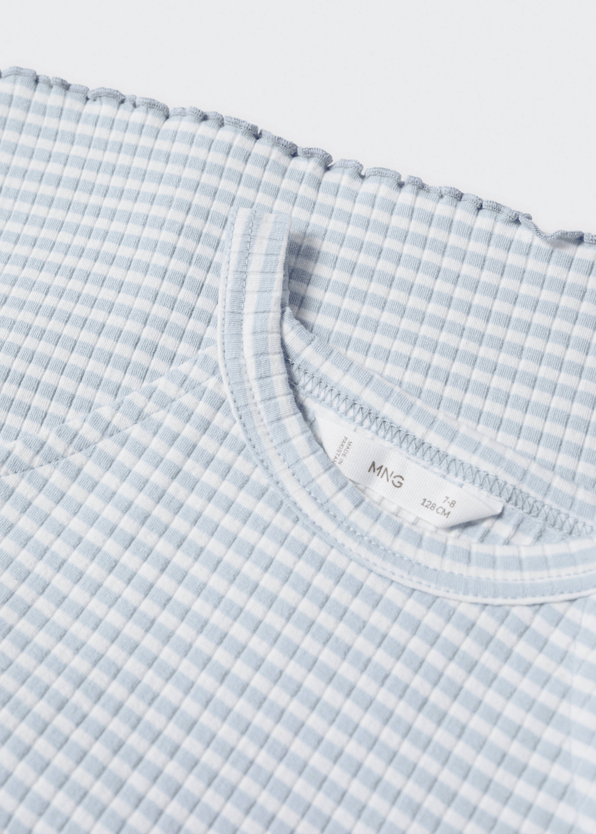 Top cotó - Detall de l'article 8