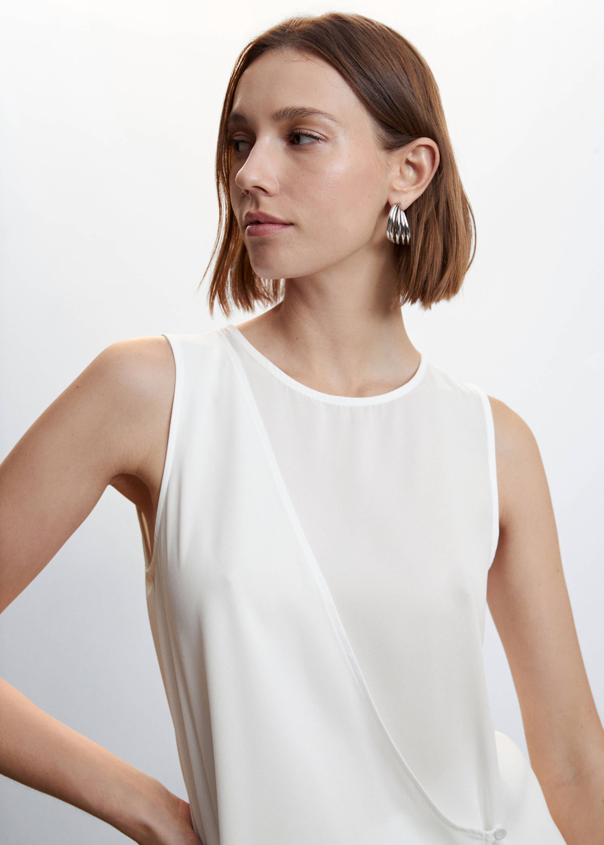 Wrap blouse with button - Details of the article 1