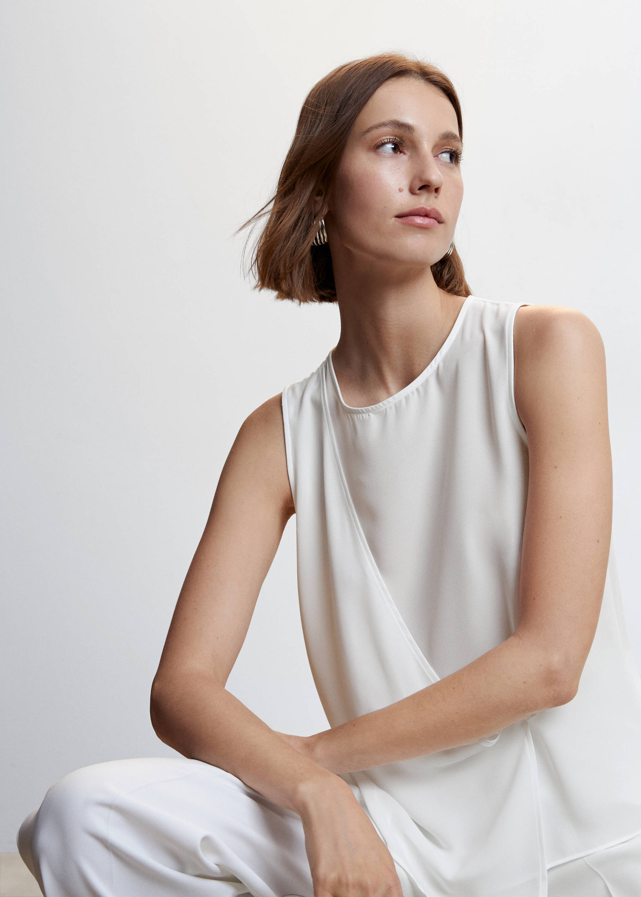 Wrap blouse with button - Details of the article 2