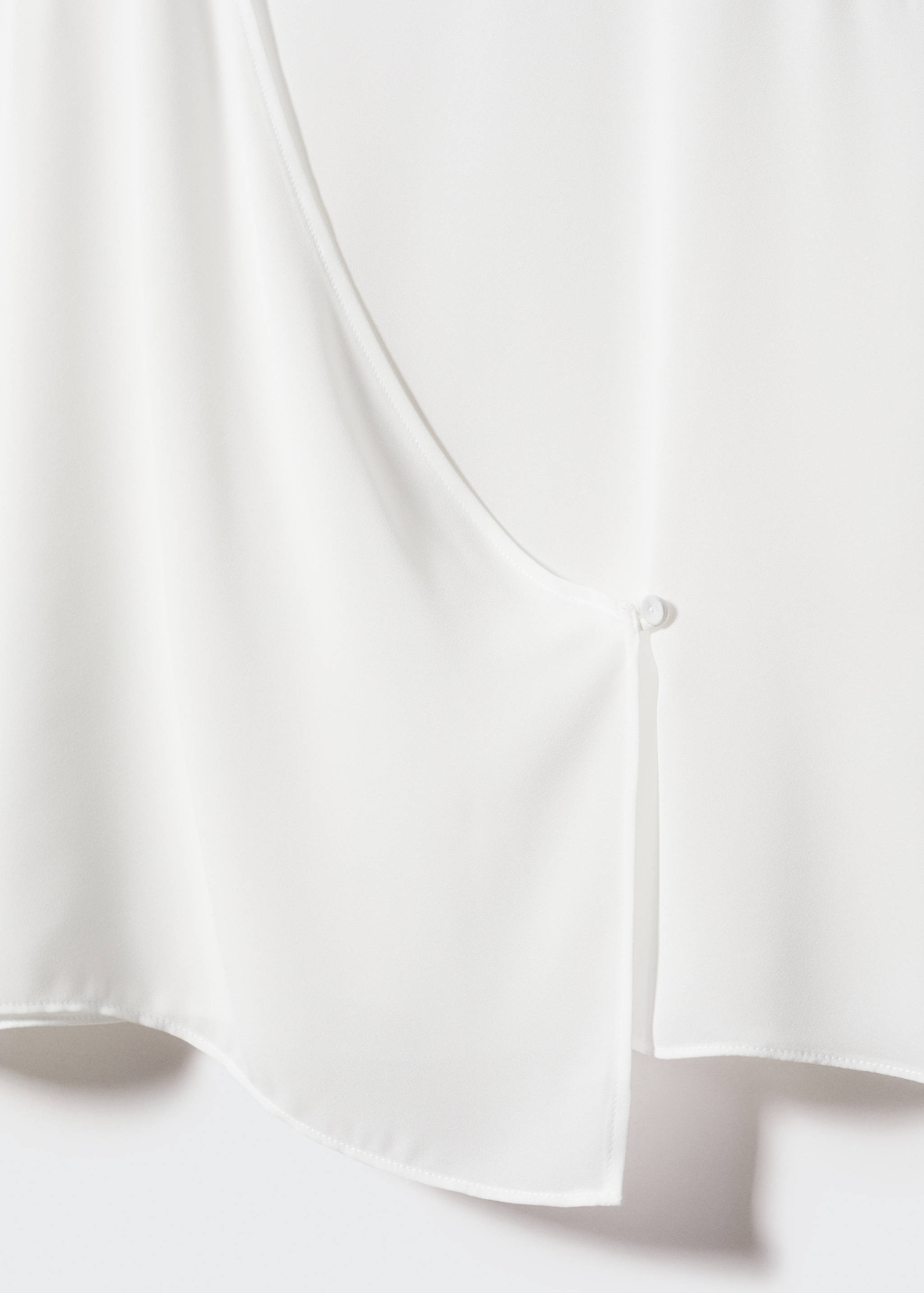 Wrap blouse with button - Details of the article 8