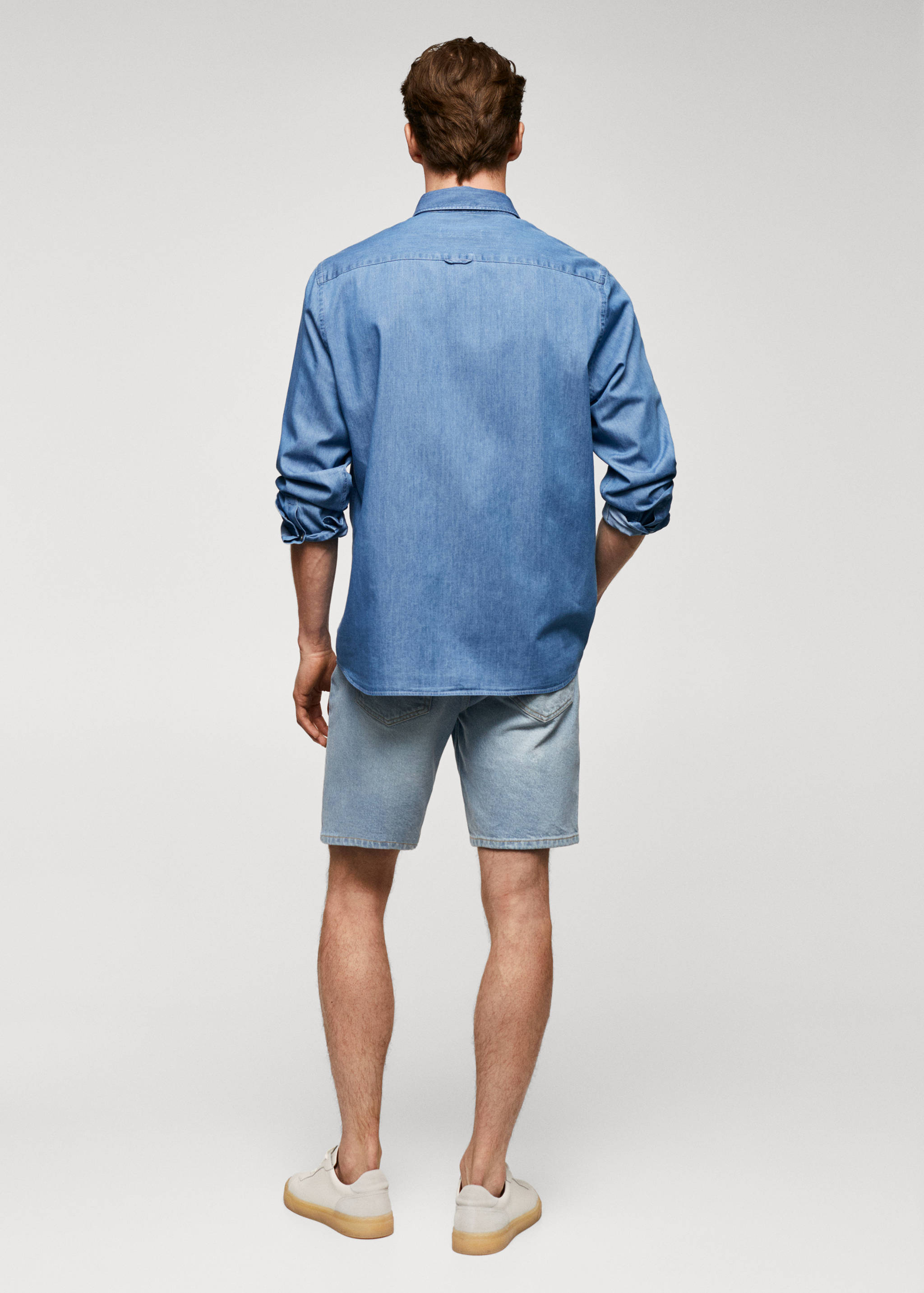 Slim-fit denim skirt with pockets - Reverse of the article