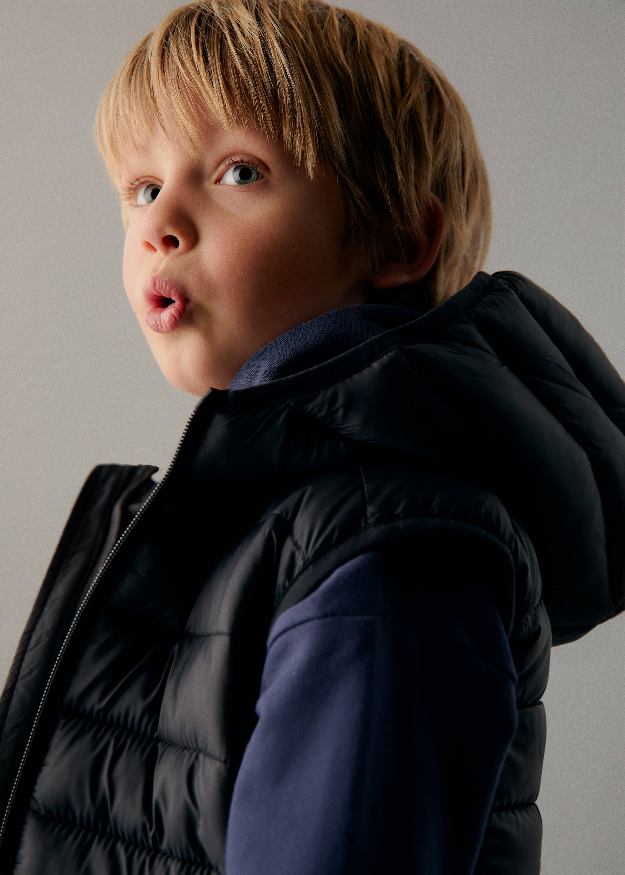 Gilet matelassé à capuche - Détail de l'article 1