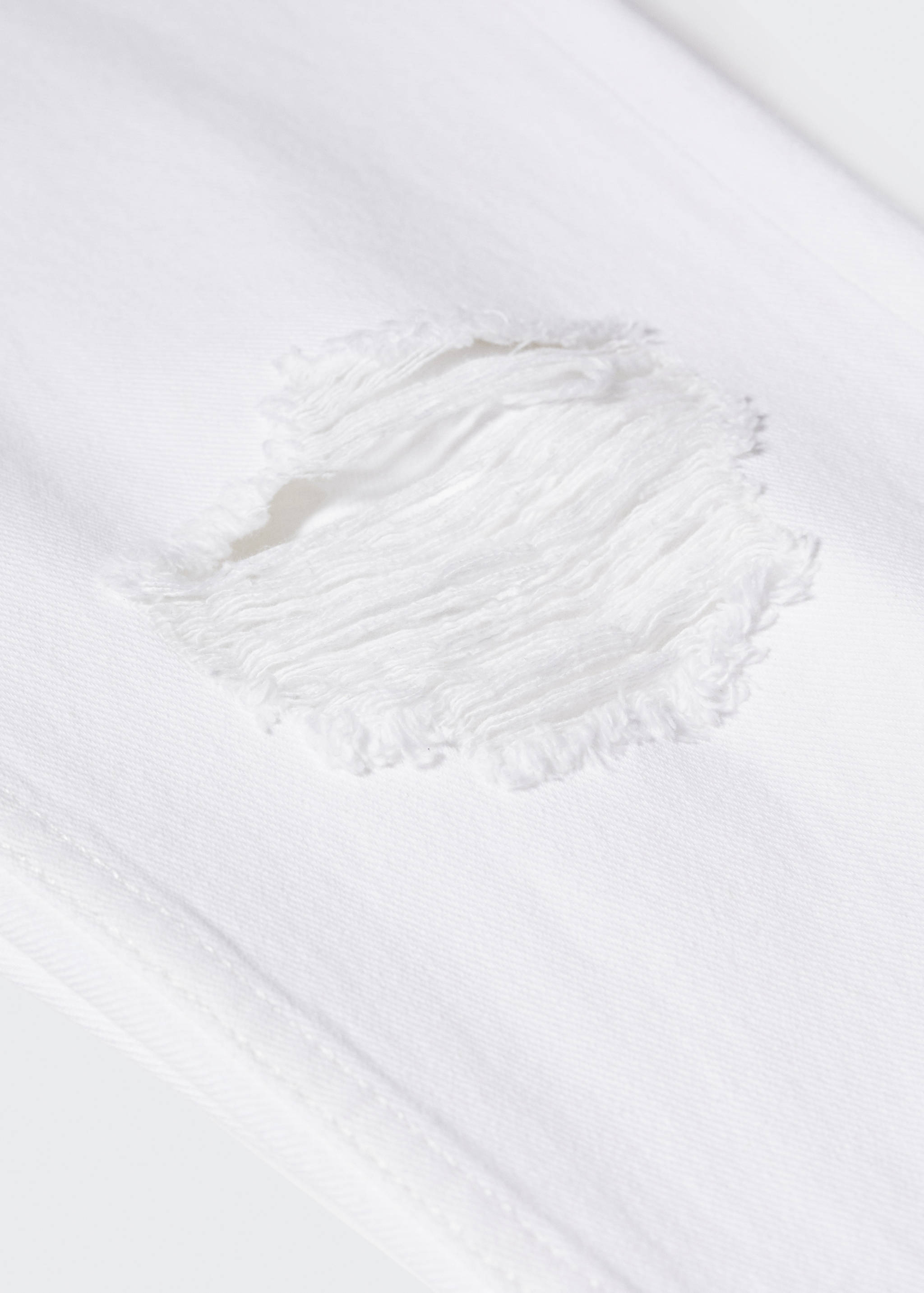 Ripped tapered-fit jeans - Details of the article 8