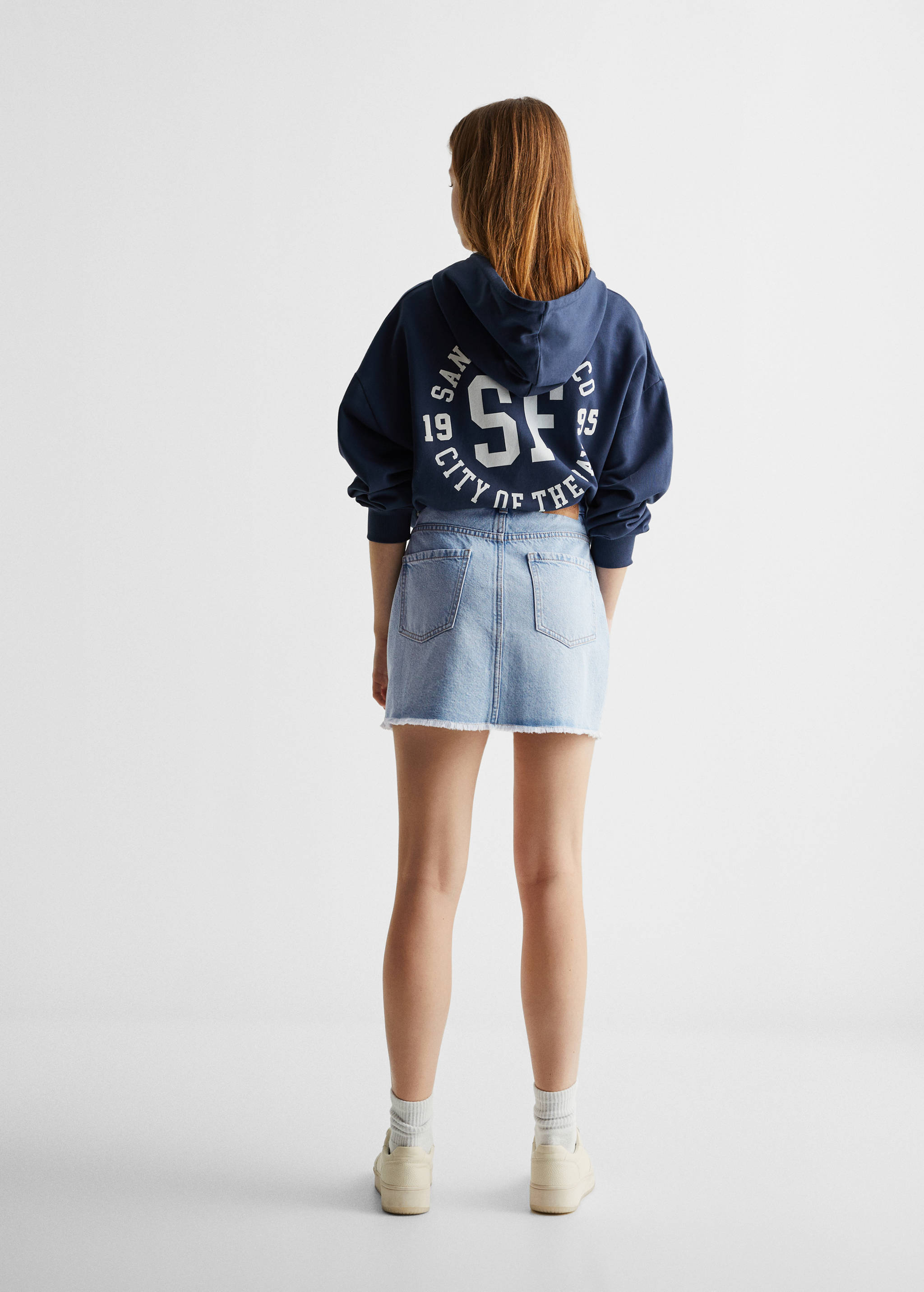 Minijupe jean ourlet effiloché - Verso de l’article