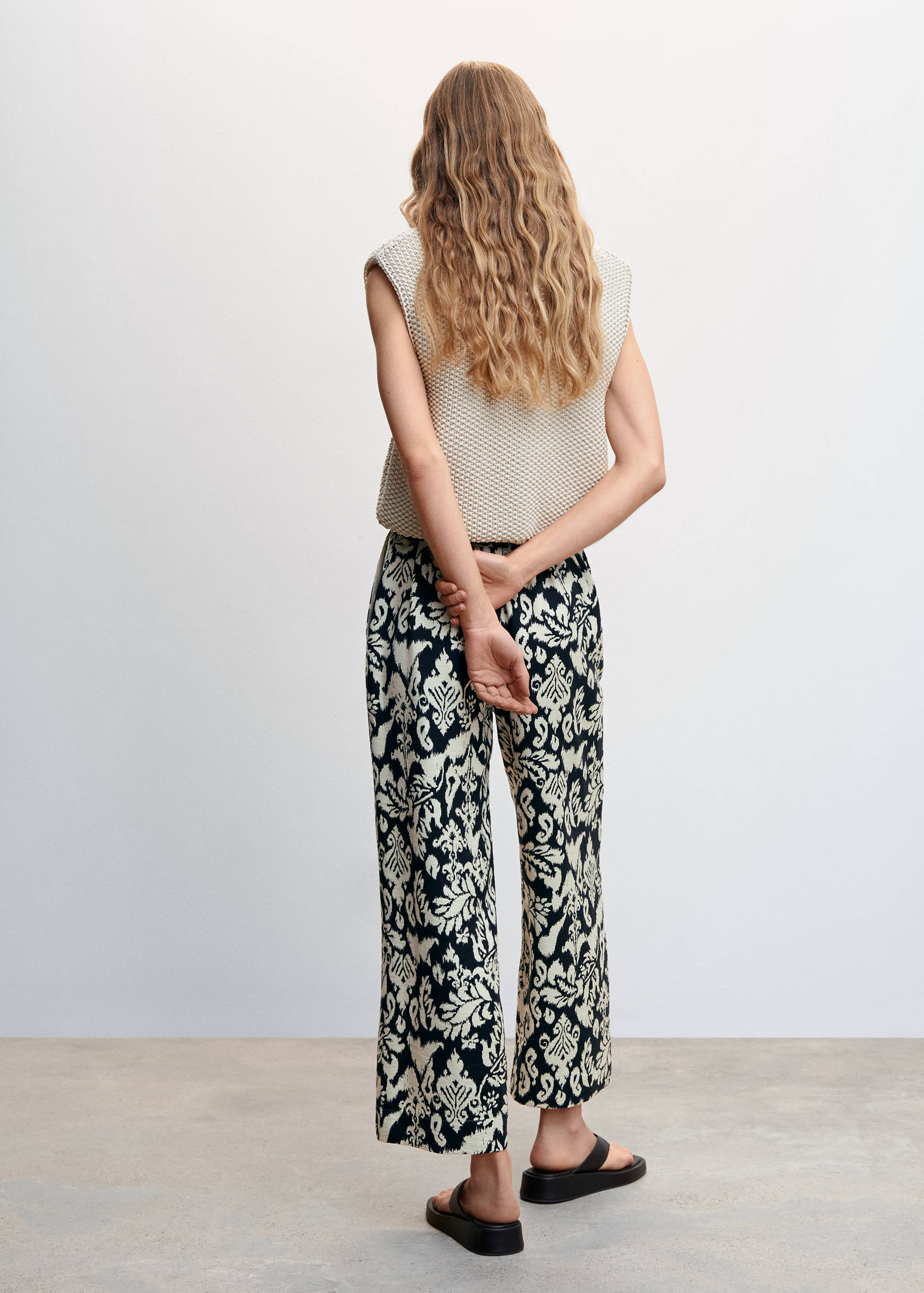 Printed trousers with bow - Reverse of the article