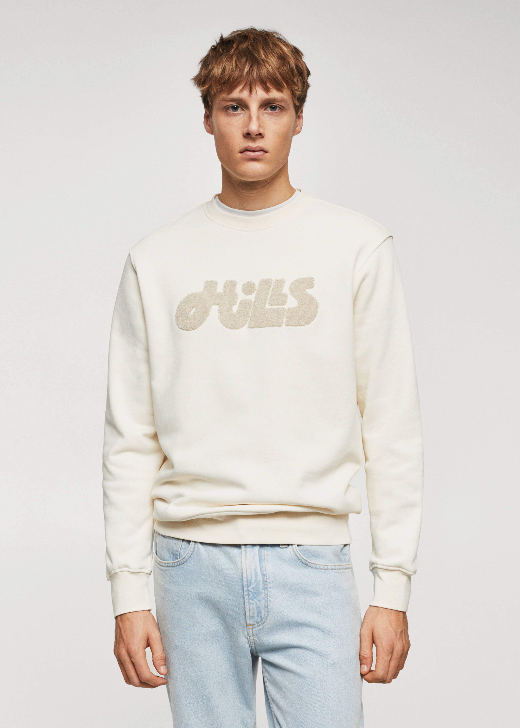 Dessuadora cotó missatge - Pla mig