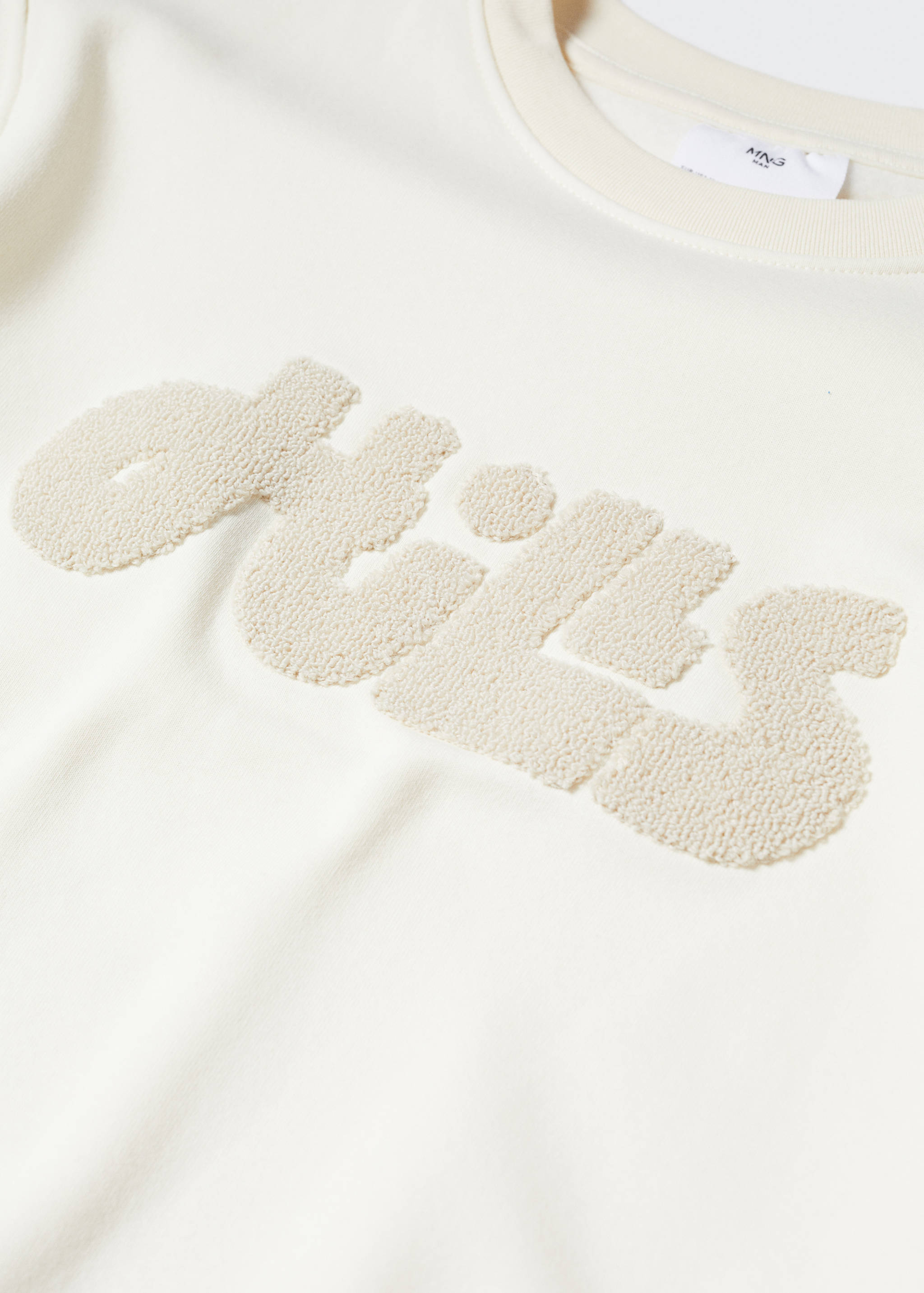 Dessuadora cotó missatge - Detall de l'article 8