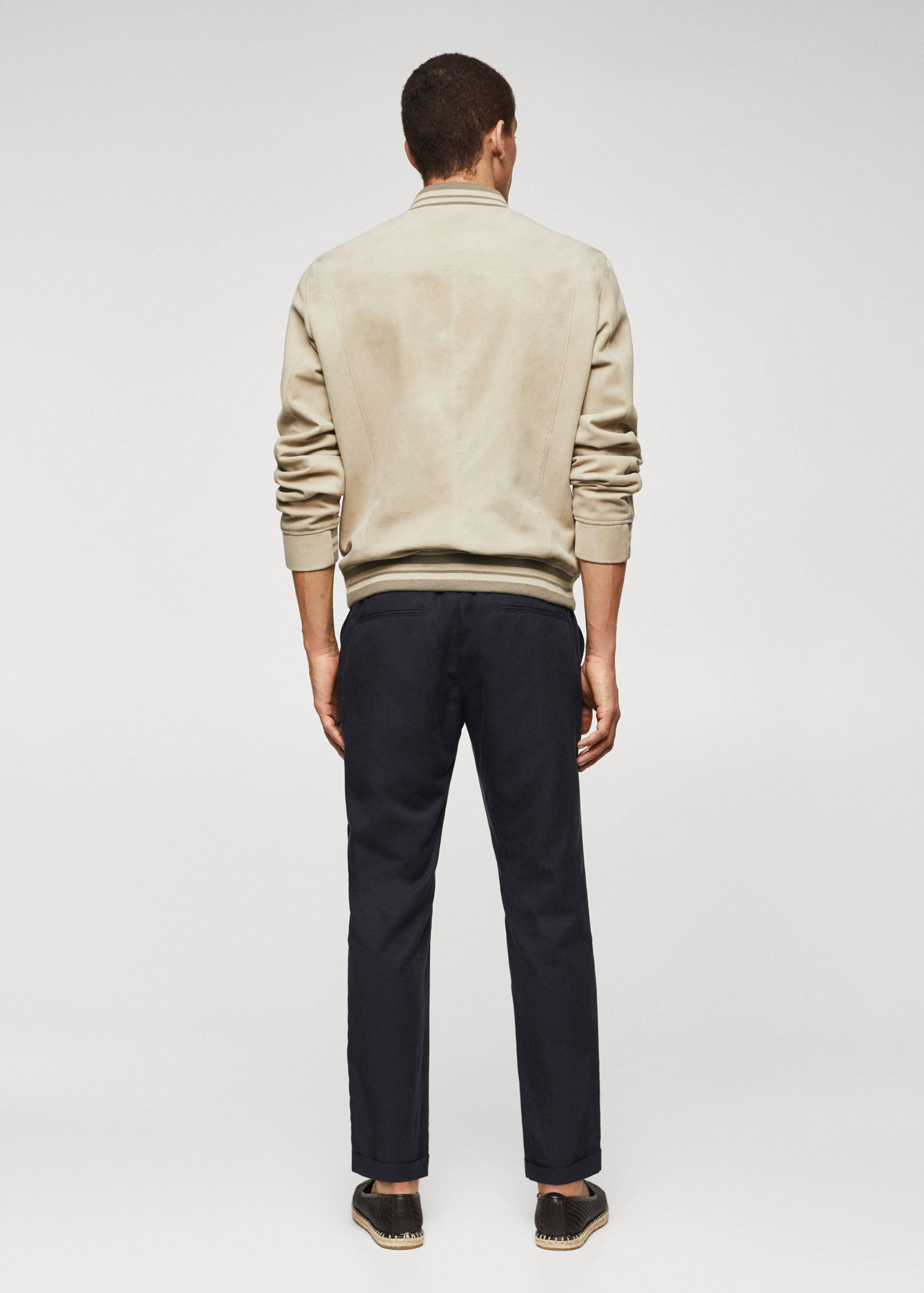 Suèdeleren bomberjack - Achterkant van het artikel