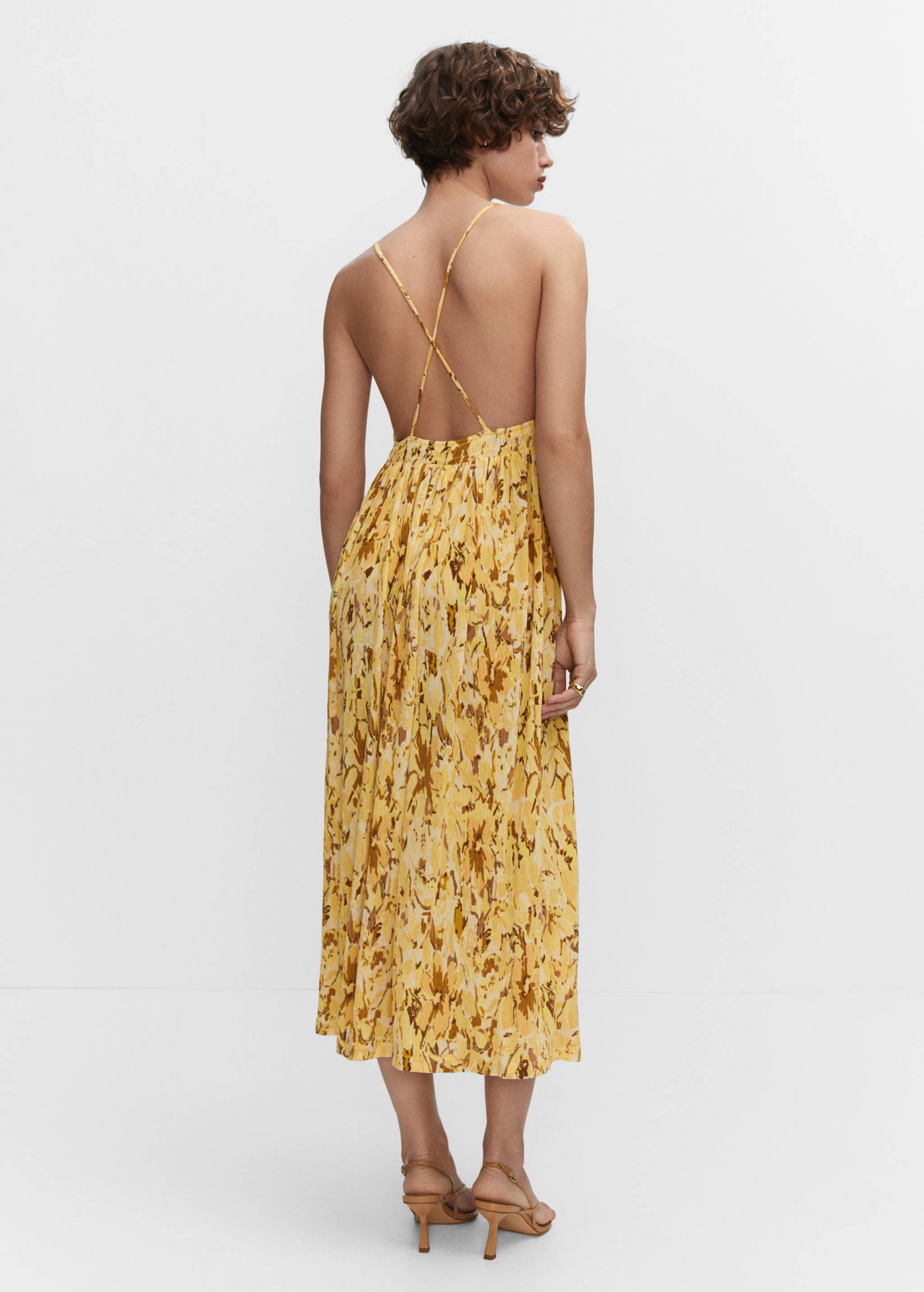 Cross-back textured dress - Reverse of the article