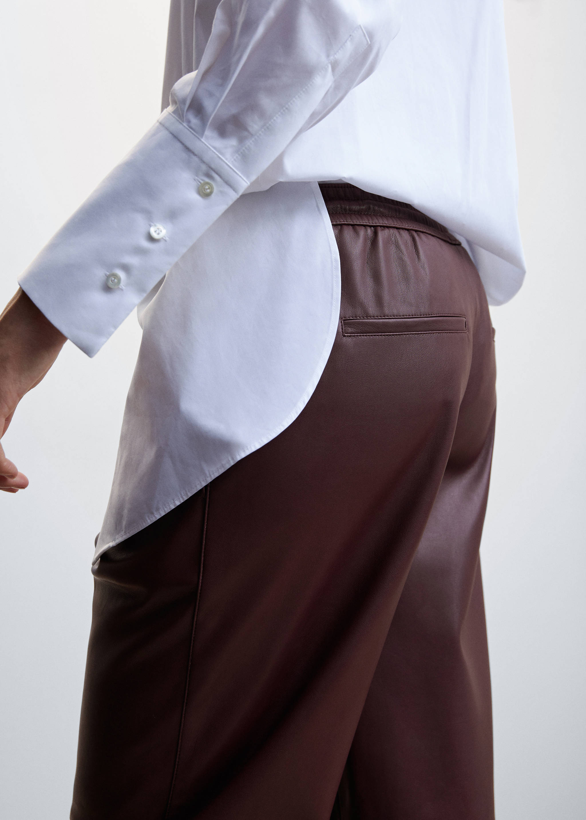 Faux-leather trousers with elastic waist - Details of the article 1