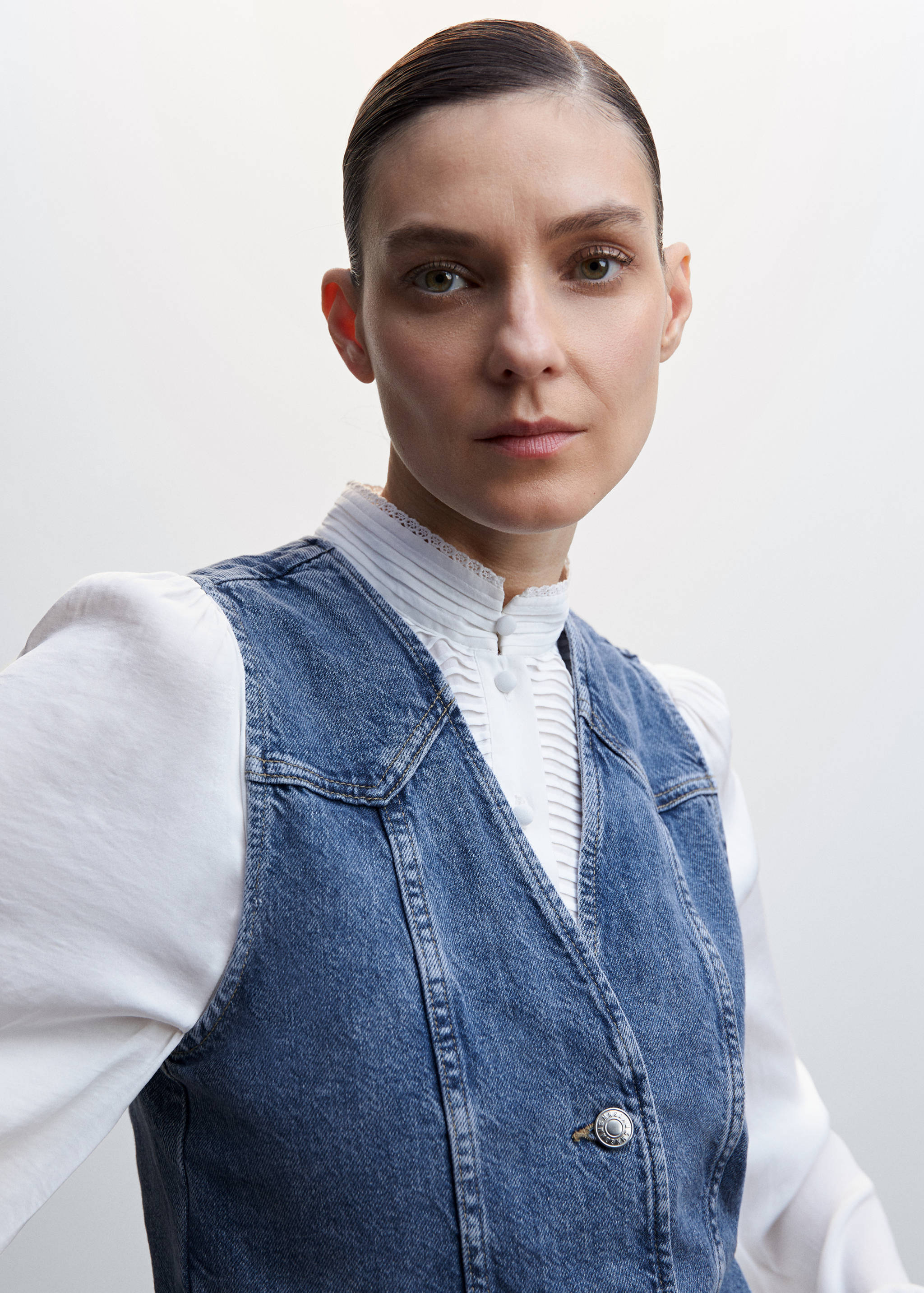 Jeansweste mit Ziernähten - Detail des Artikels 1