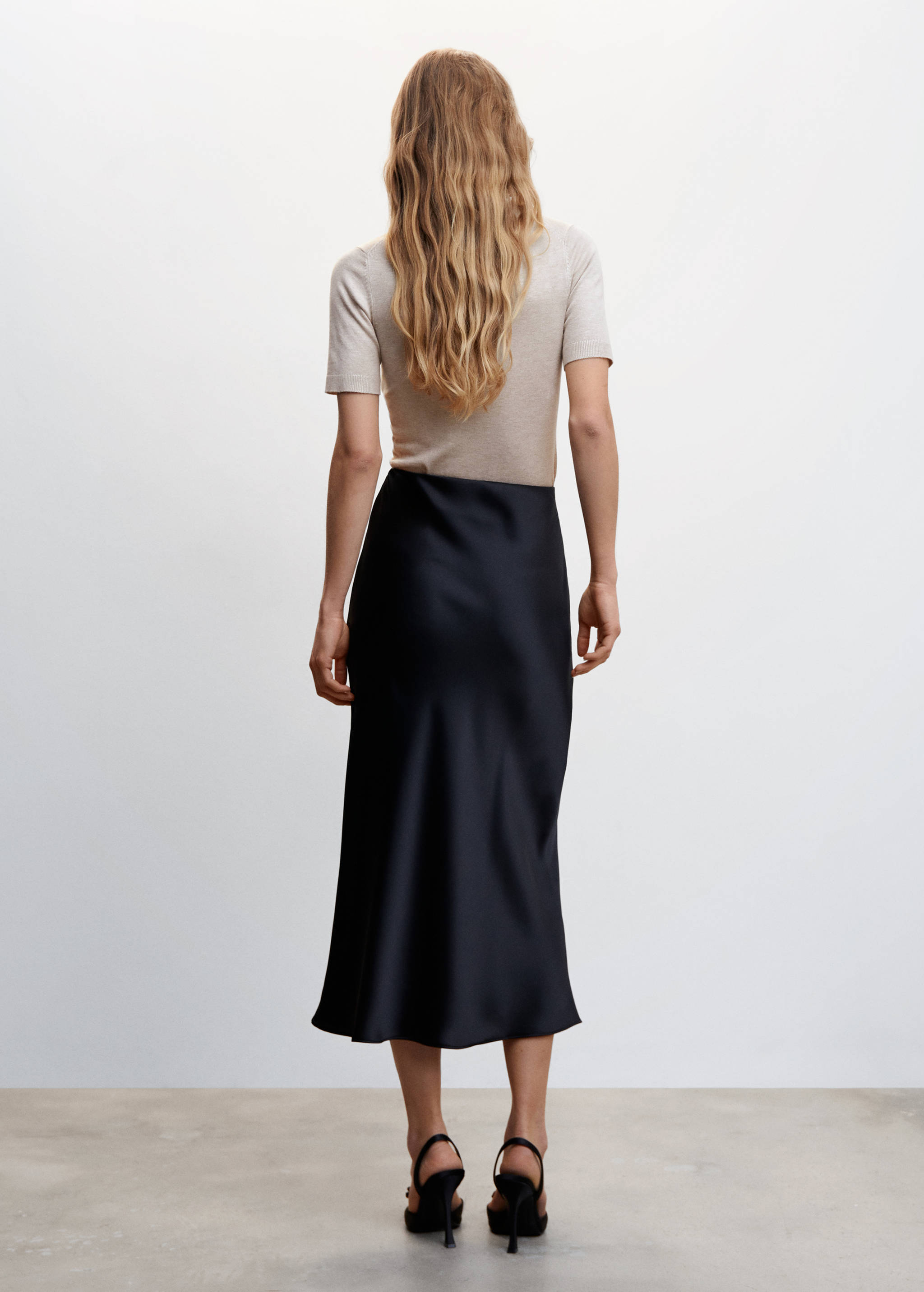 Jersei punt coll girat - Revers de l'article