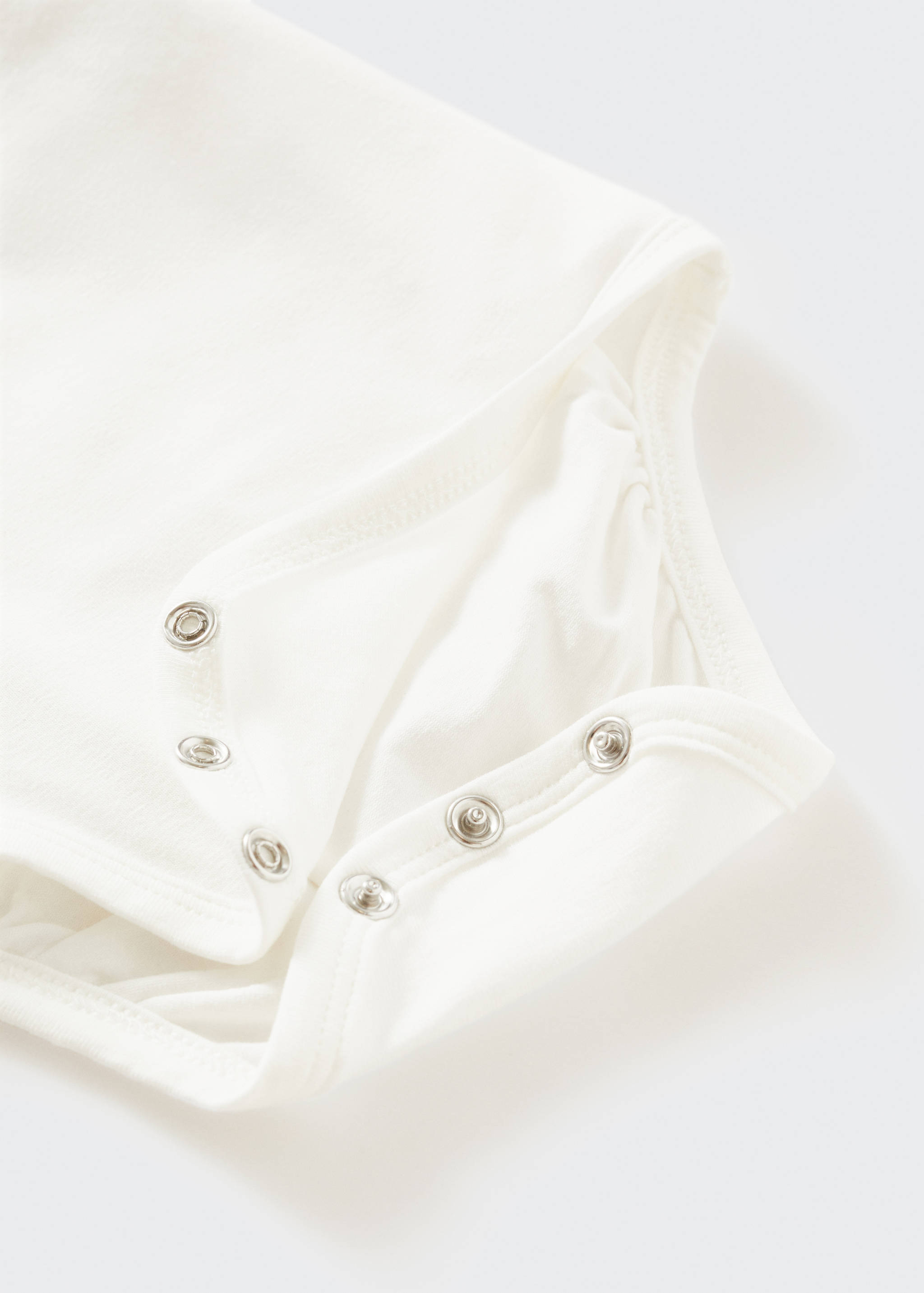 Baumwoll-Body mit besticktem Kragen - Detail des Artikels 8