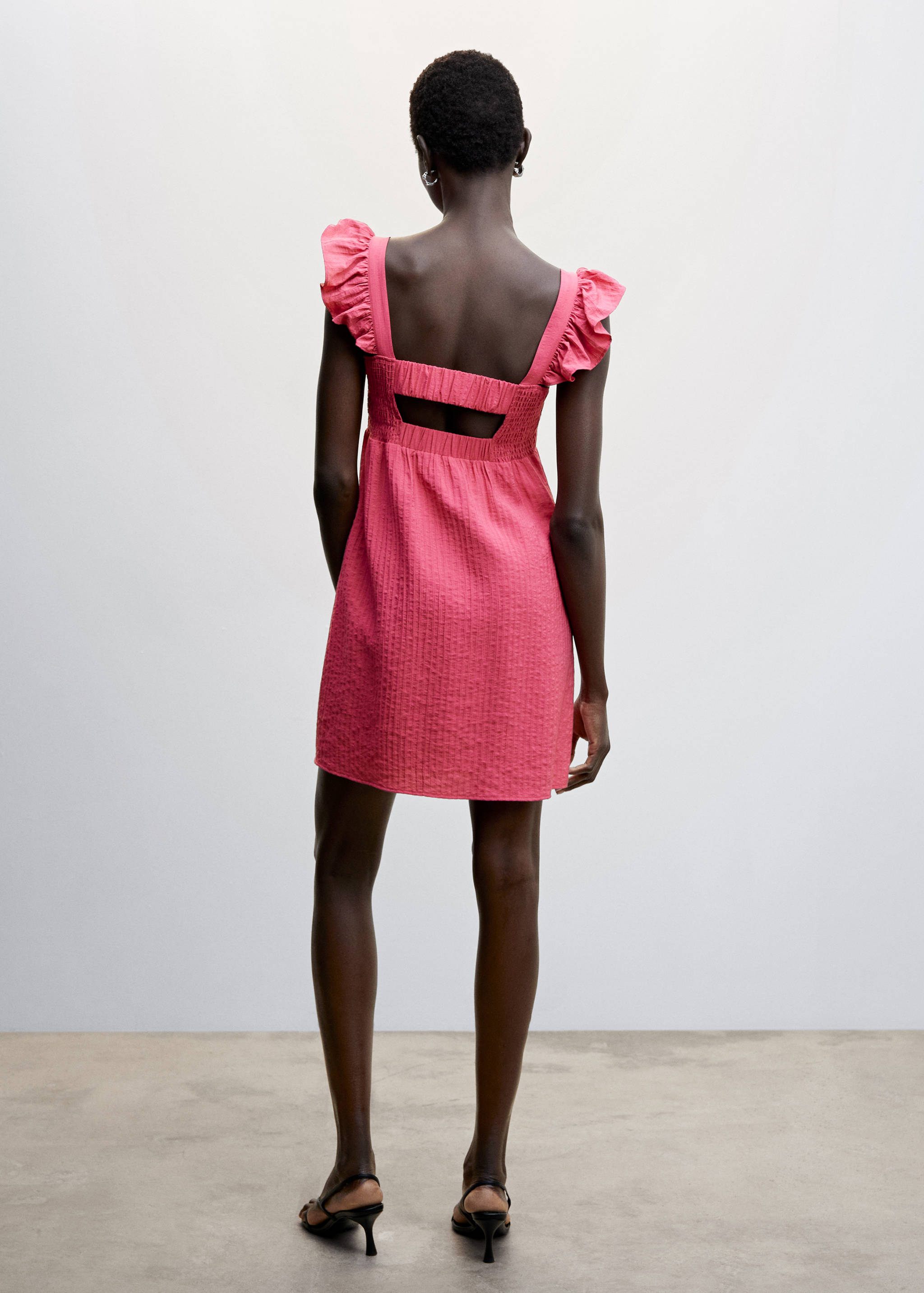 Vestit curt volants - Revers de l'article