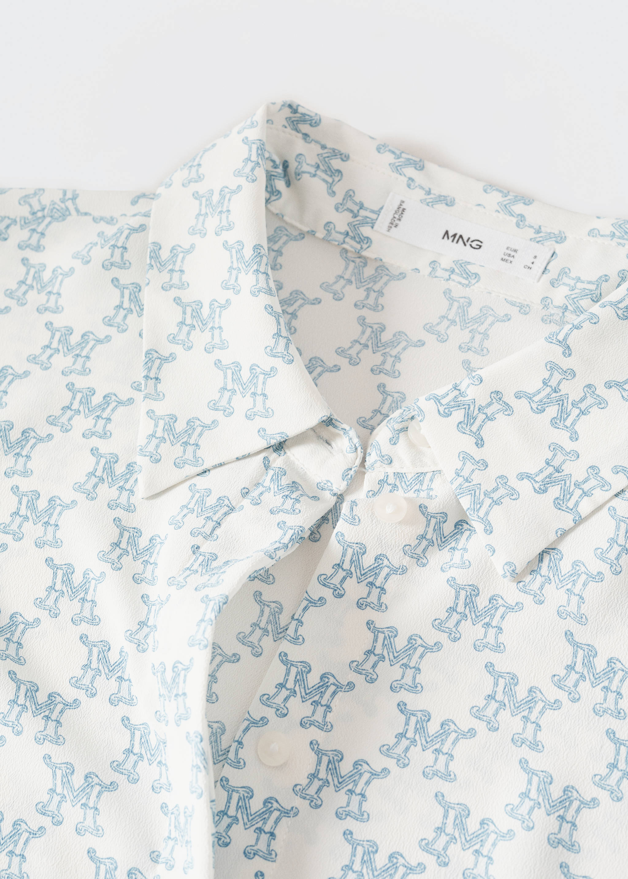 Buttoned flowy shirt - Details of the article 8