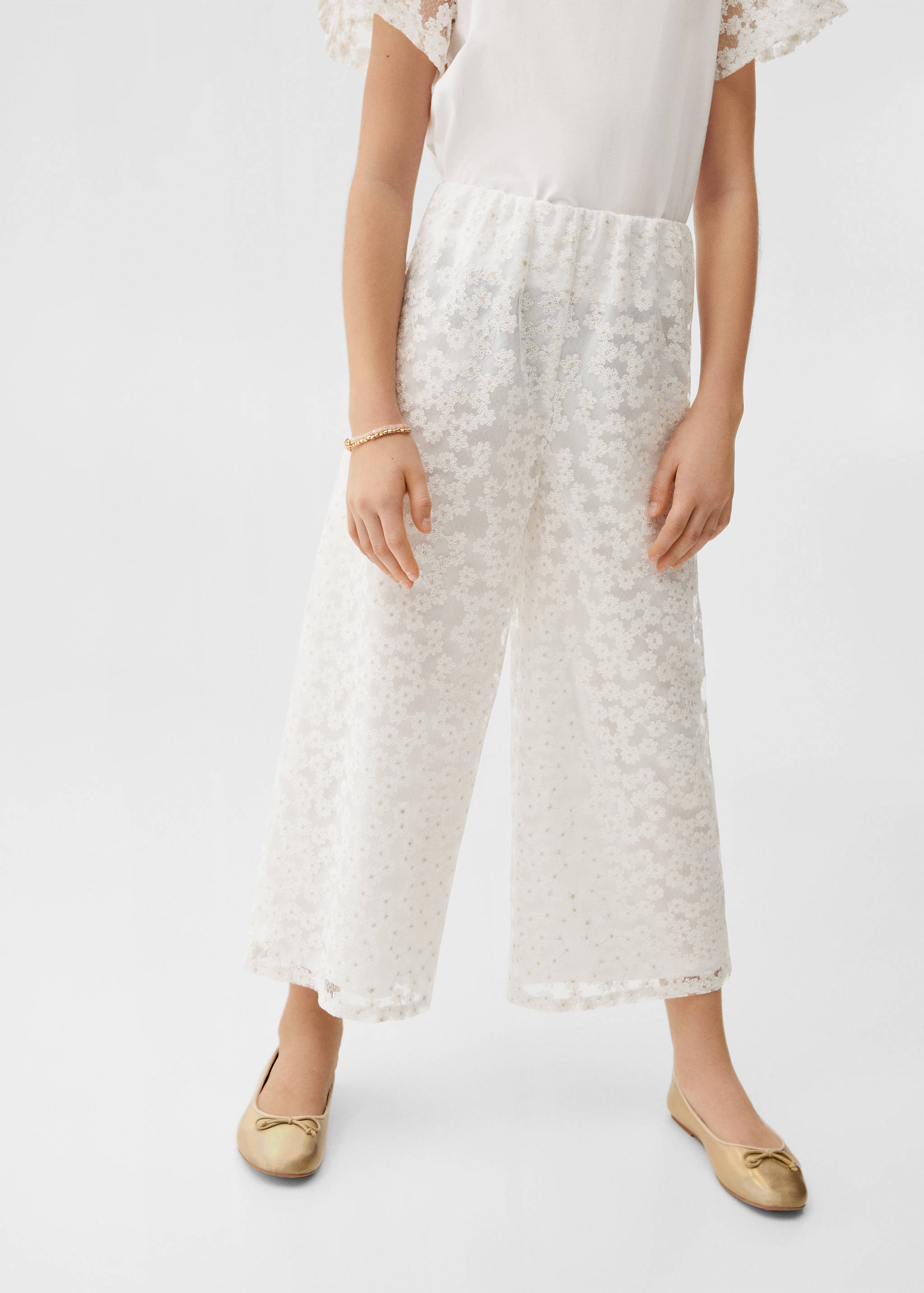 Culotte trousers with embroidered flowers  - Details of the article 6