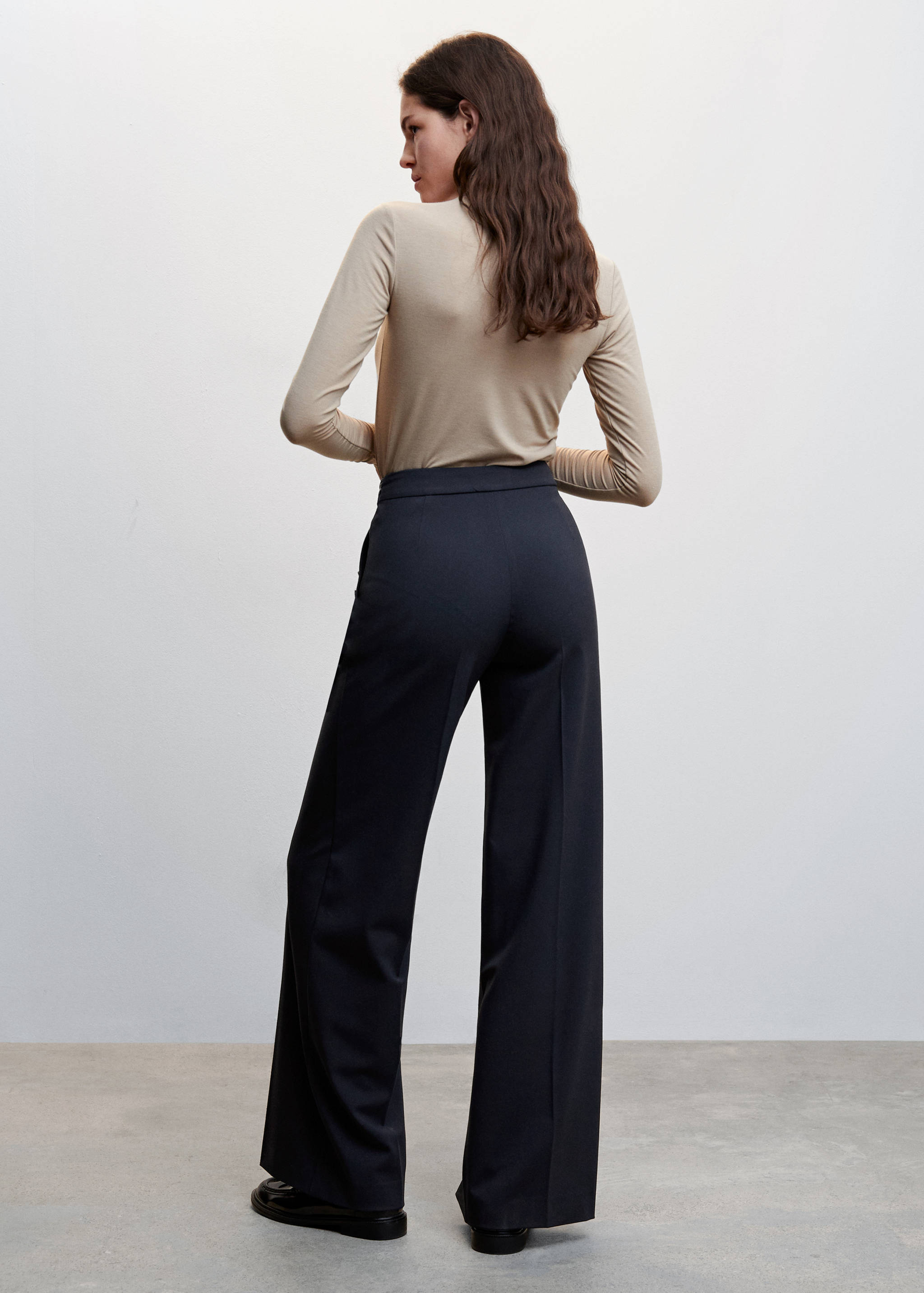 Side buttons trousers - Reverse of the article