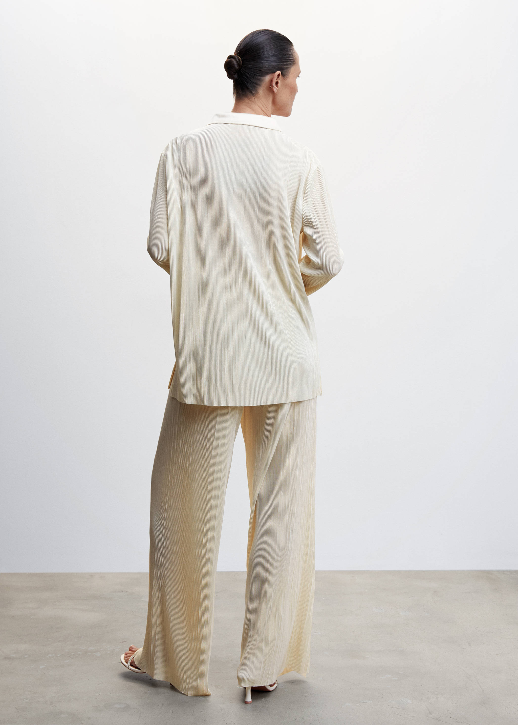 Camisa plisada - Reverso del artículo