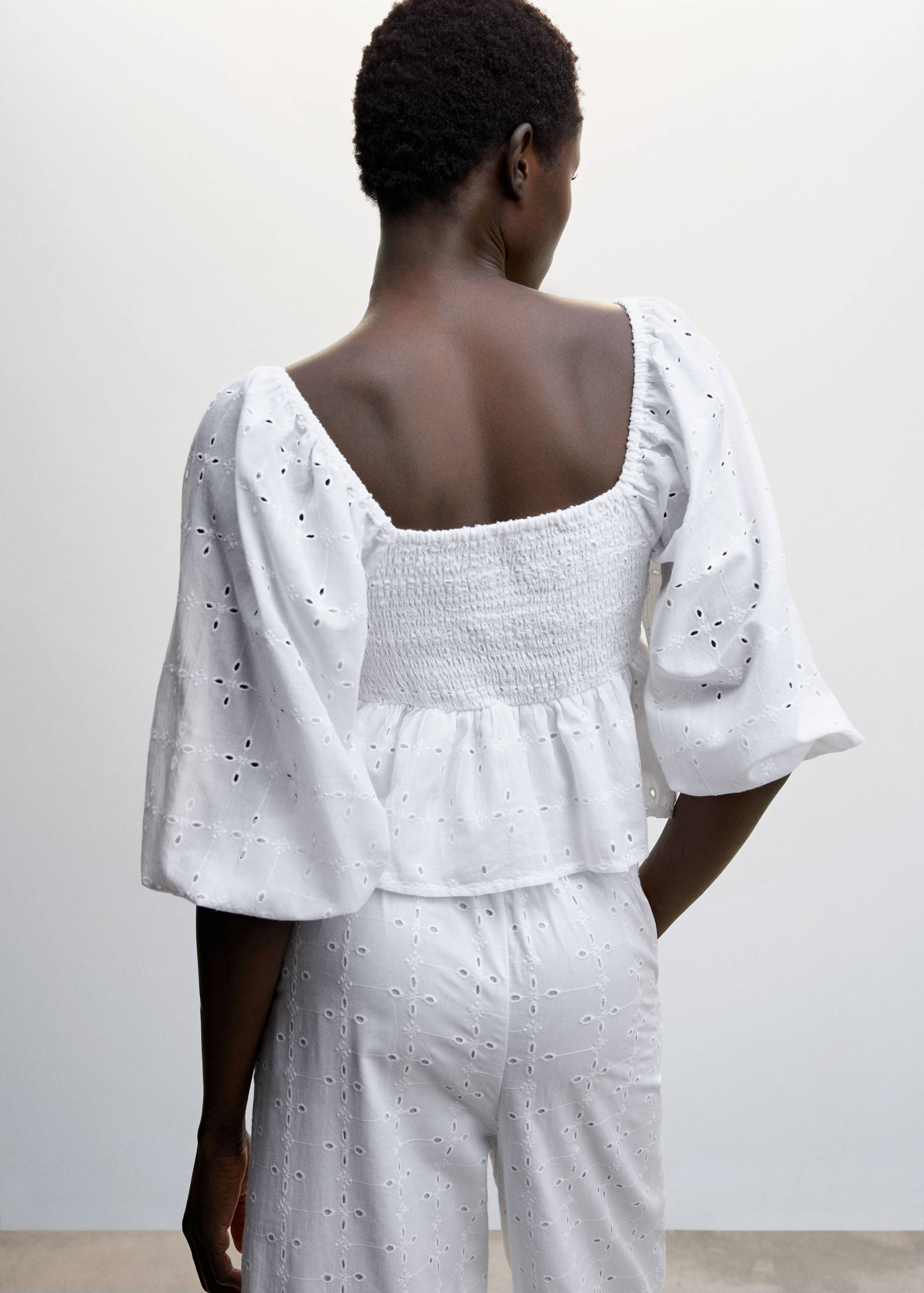 Blusa mangas abullonadas - Reverso del artículo