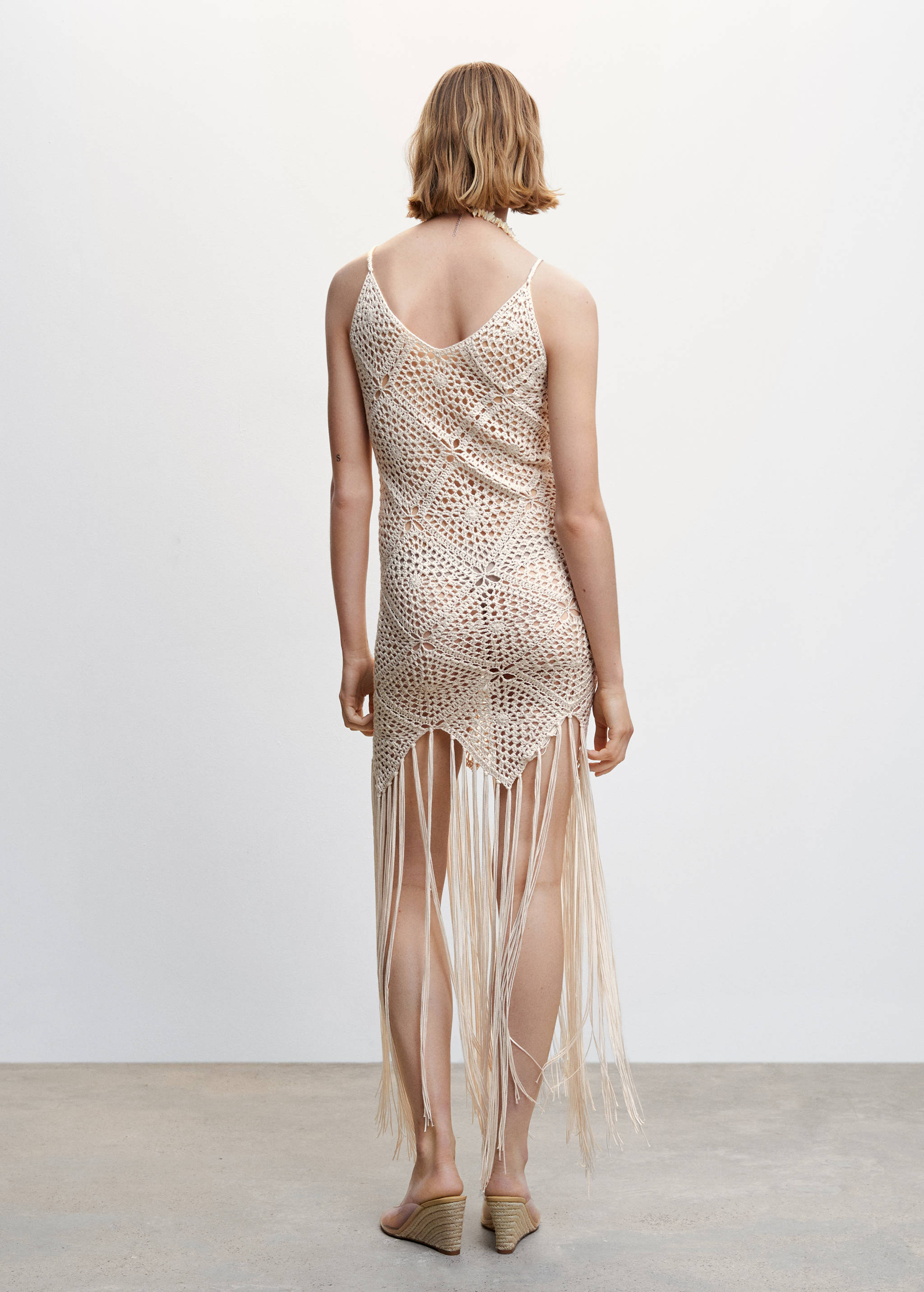 Crochet dress with fringes - Reverse of the article