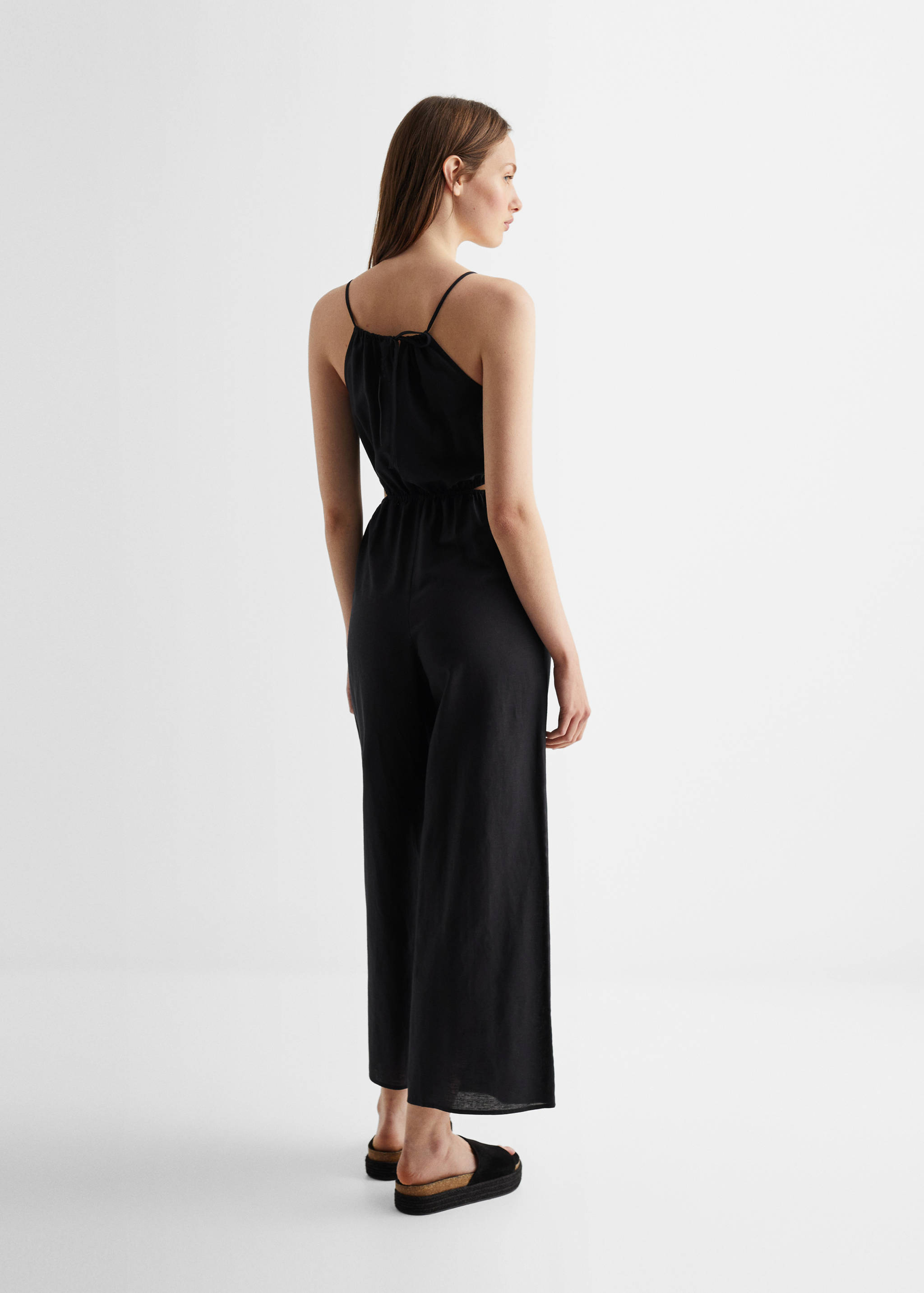 Langer Jumpsuit mit Schlitzen - Rückseite des Artikels