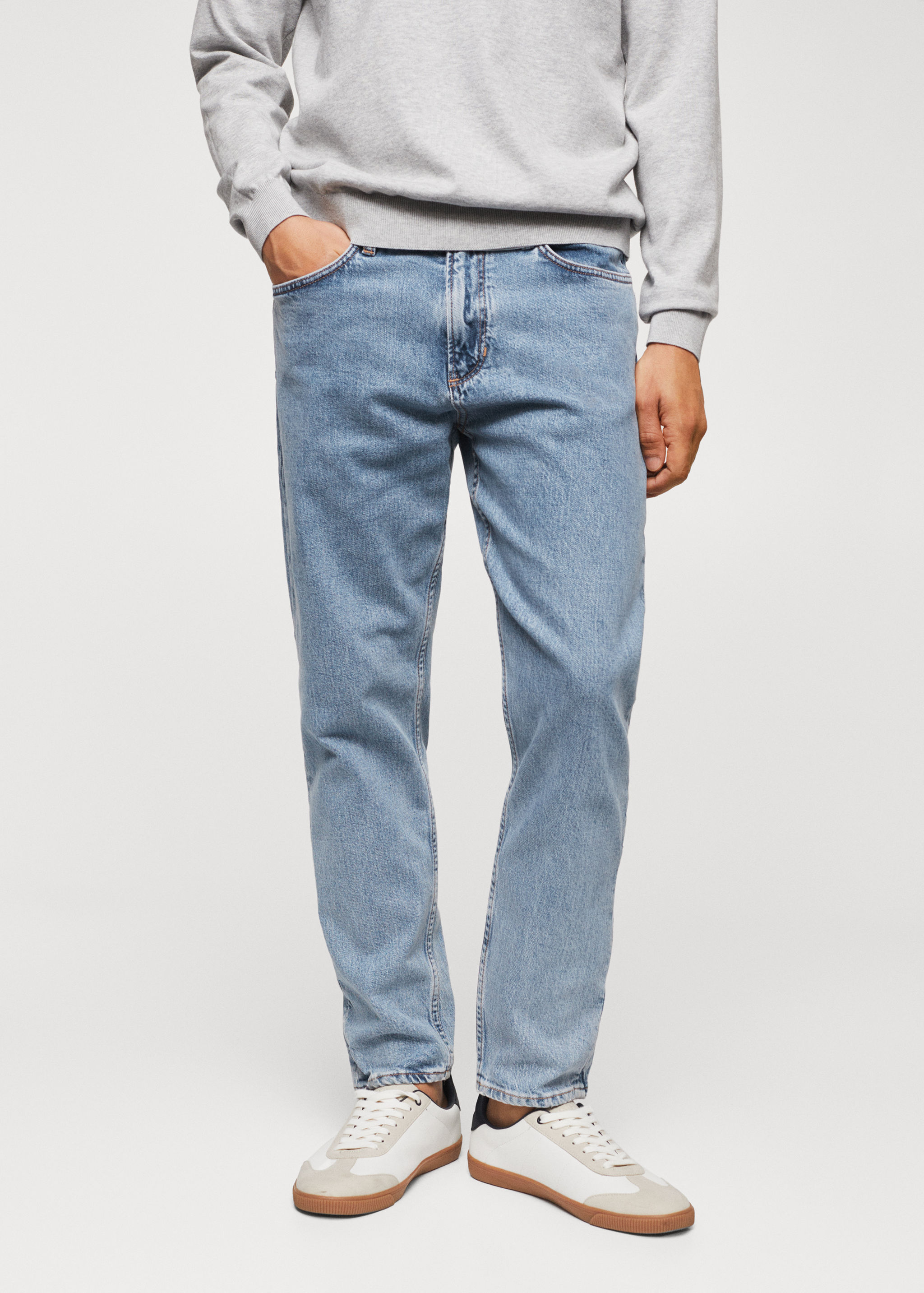 Jeans Ben tapered e cropped - Plano médio