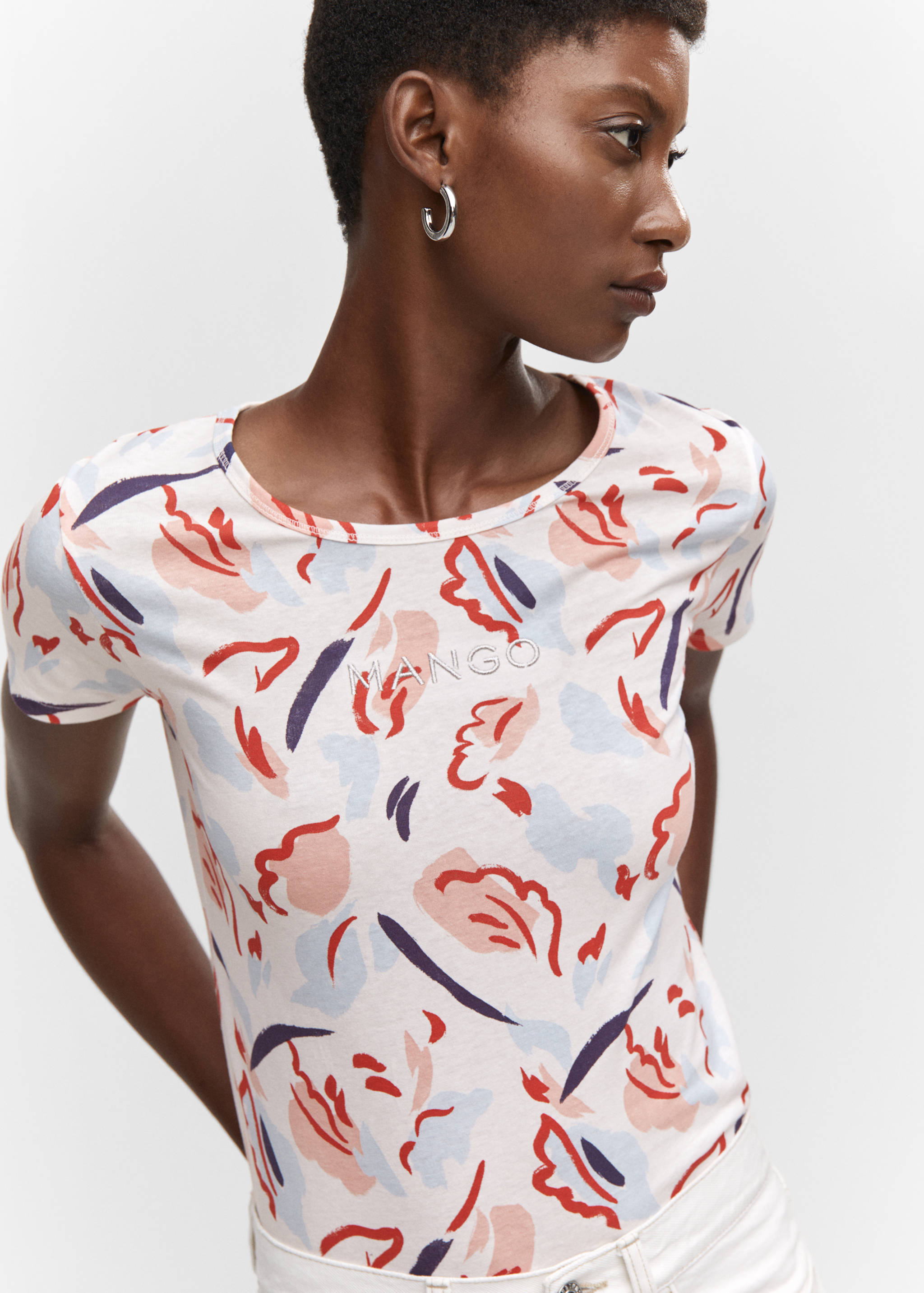 Gemustertes T-Shirt mit gesticktem Logo - Detail des Artikels 1