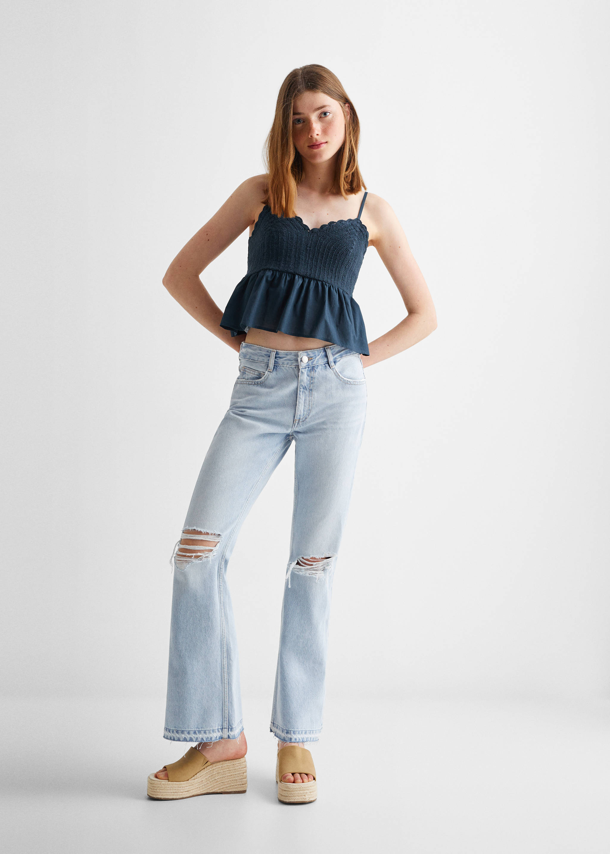 Flared jeans with decorative rips - General plane