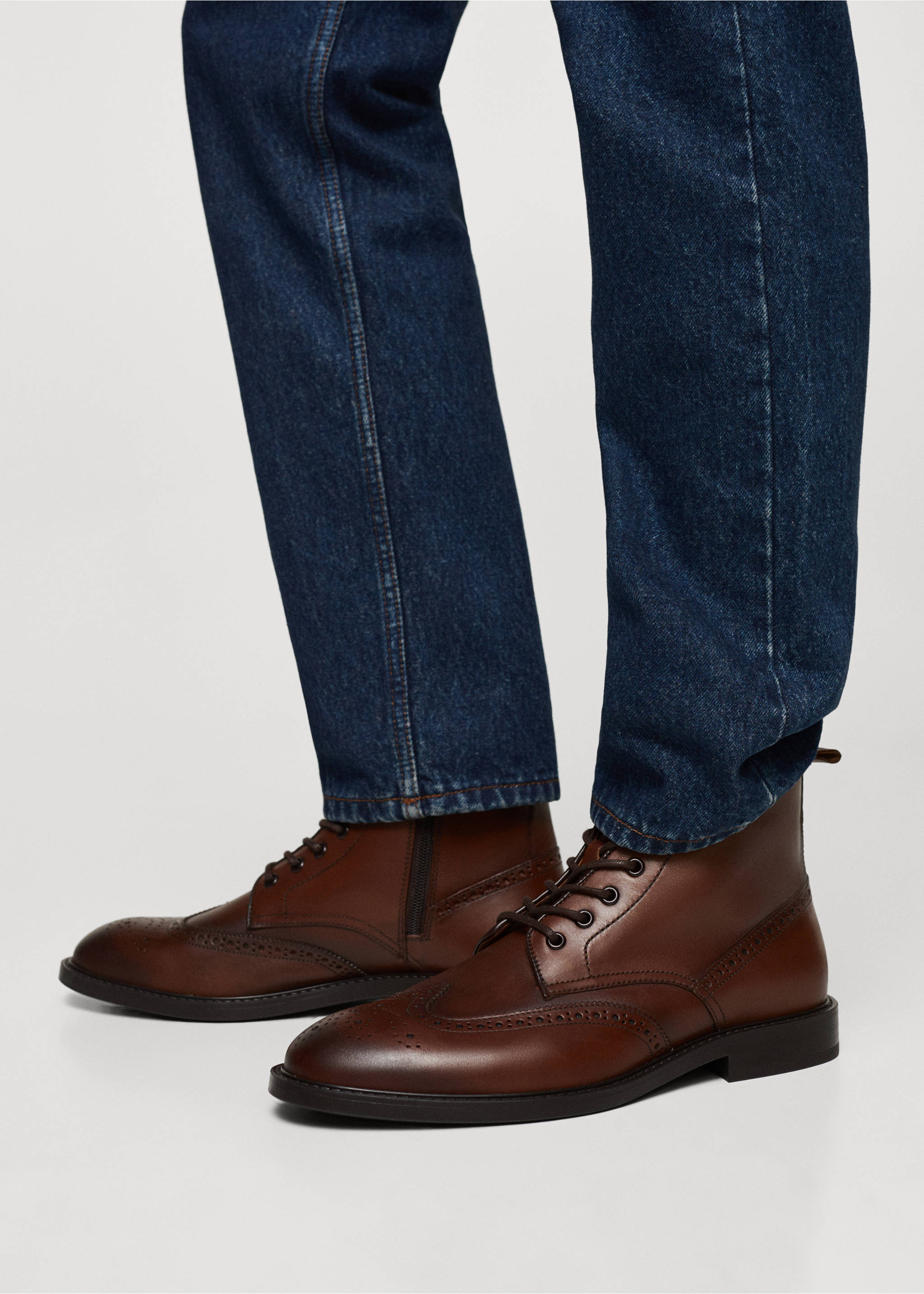 Die-cut leather ankle boots - Details of the article 9, Leather. Ref: 57006031-00.