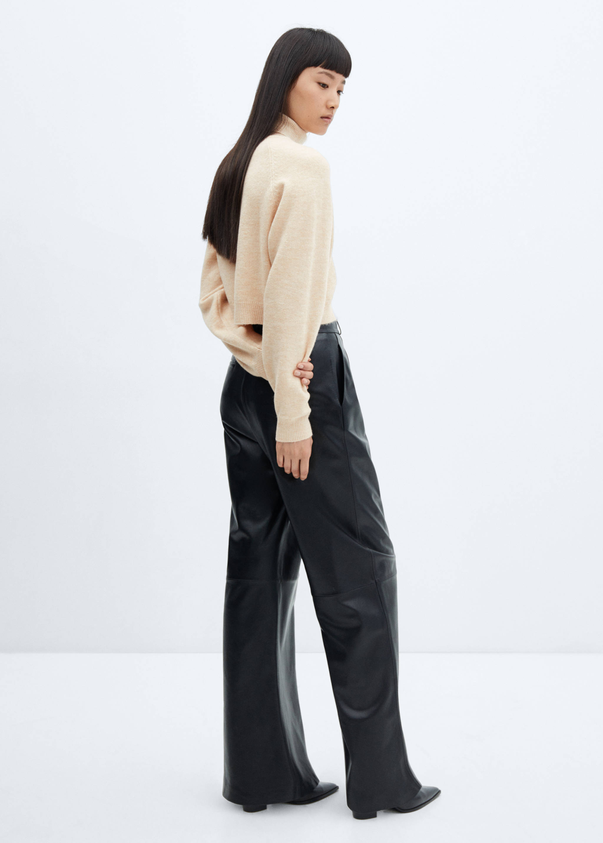 Turtleneck knitted sweater - Reverse of the article