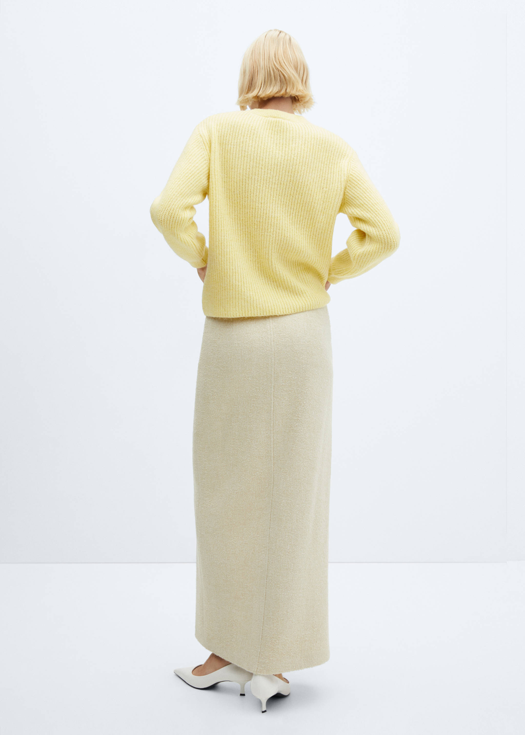 Round-neck knitted sweater - Reverse of the article